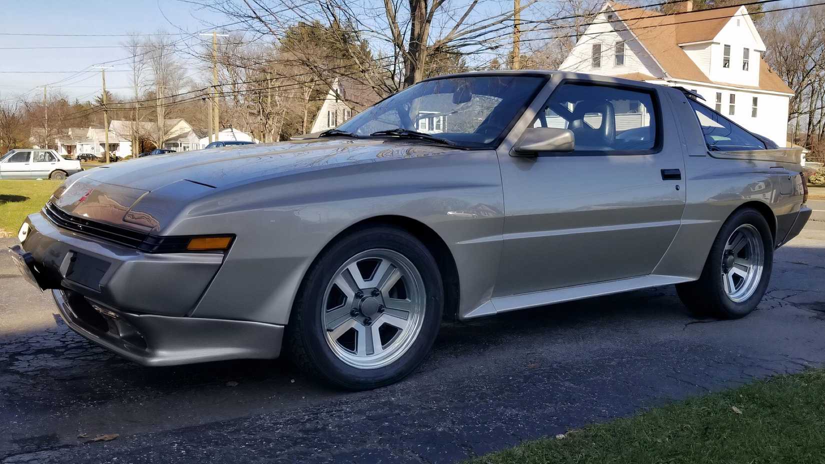1988 Mitsubishi Starion in silver parked on driveway