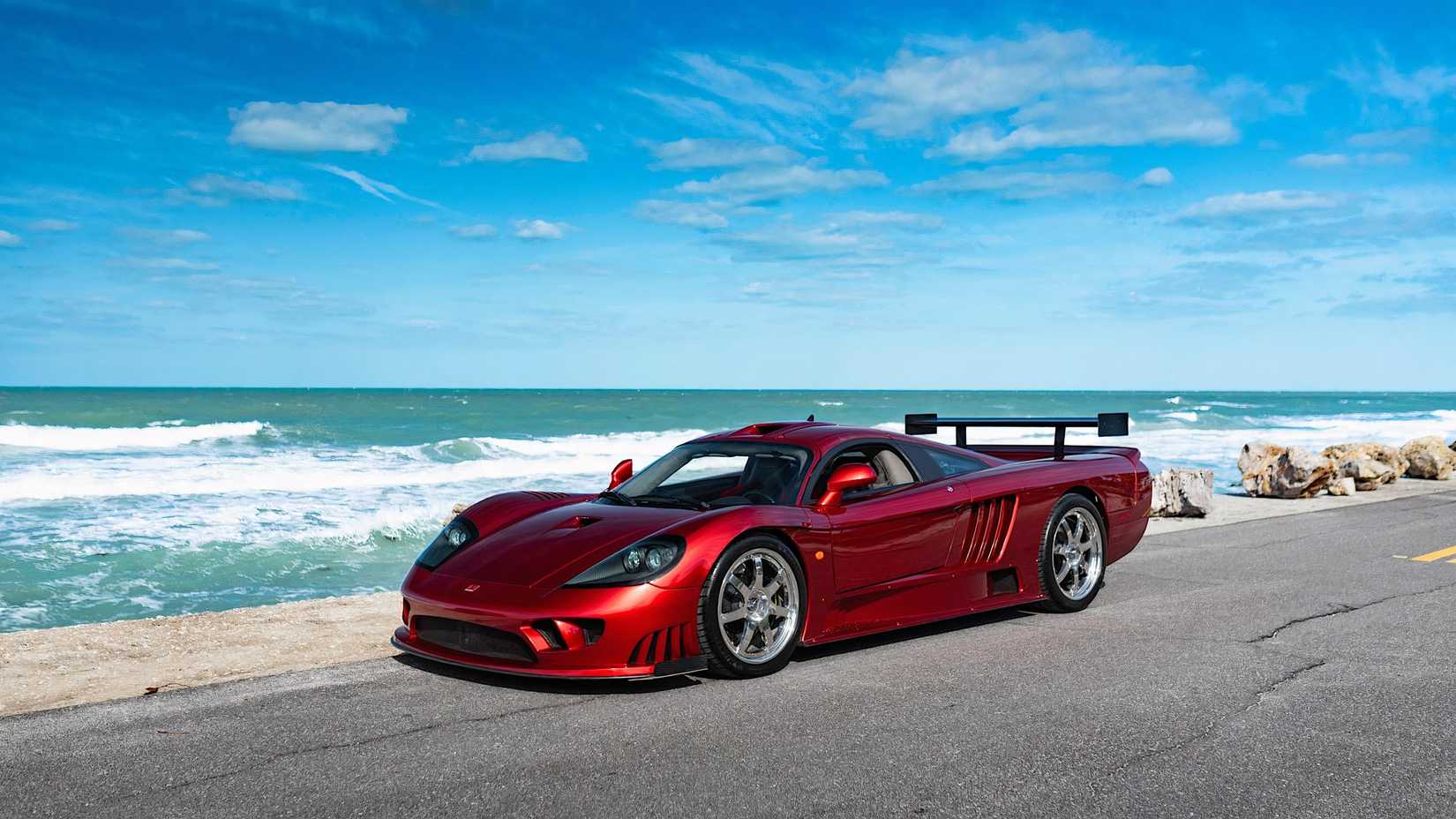 2005 Saleen S7 Twin Turbo Competition in red parked on coastal road