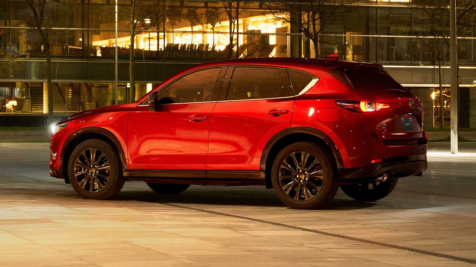 2025 Mazda CX-5 in red parked on city street
