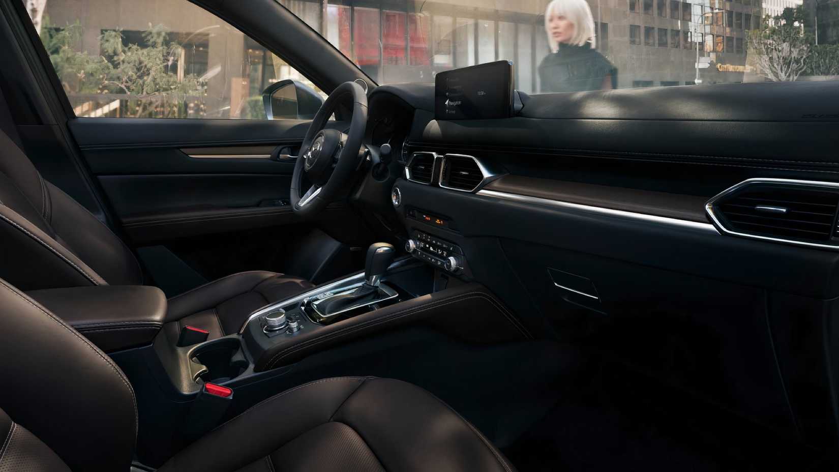2025 Mazda CX-5 interior showing front seats and cockpit
