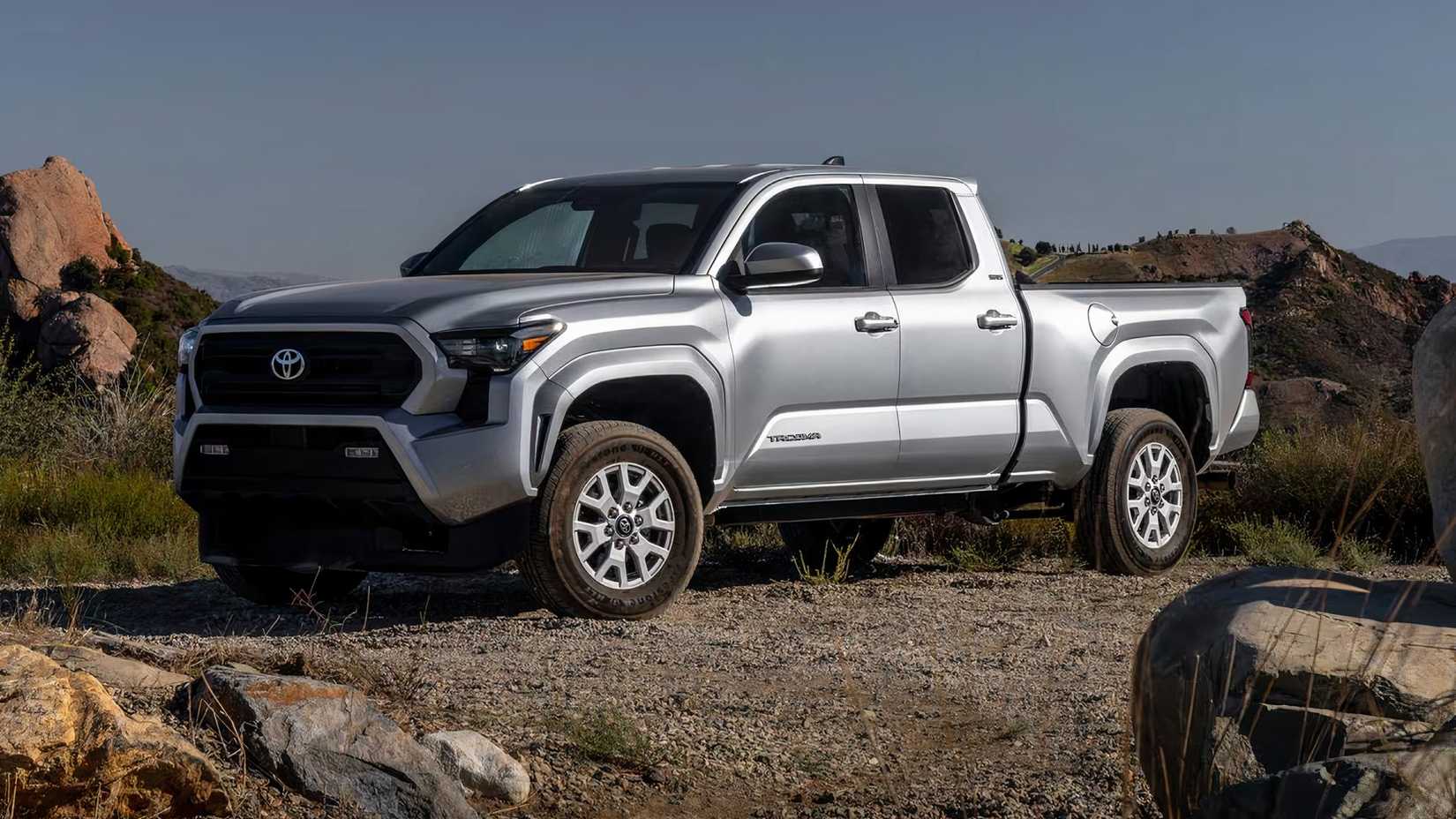 2025 Toyota Tacoma SR5 Crew Cab in silver parked off road