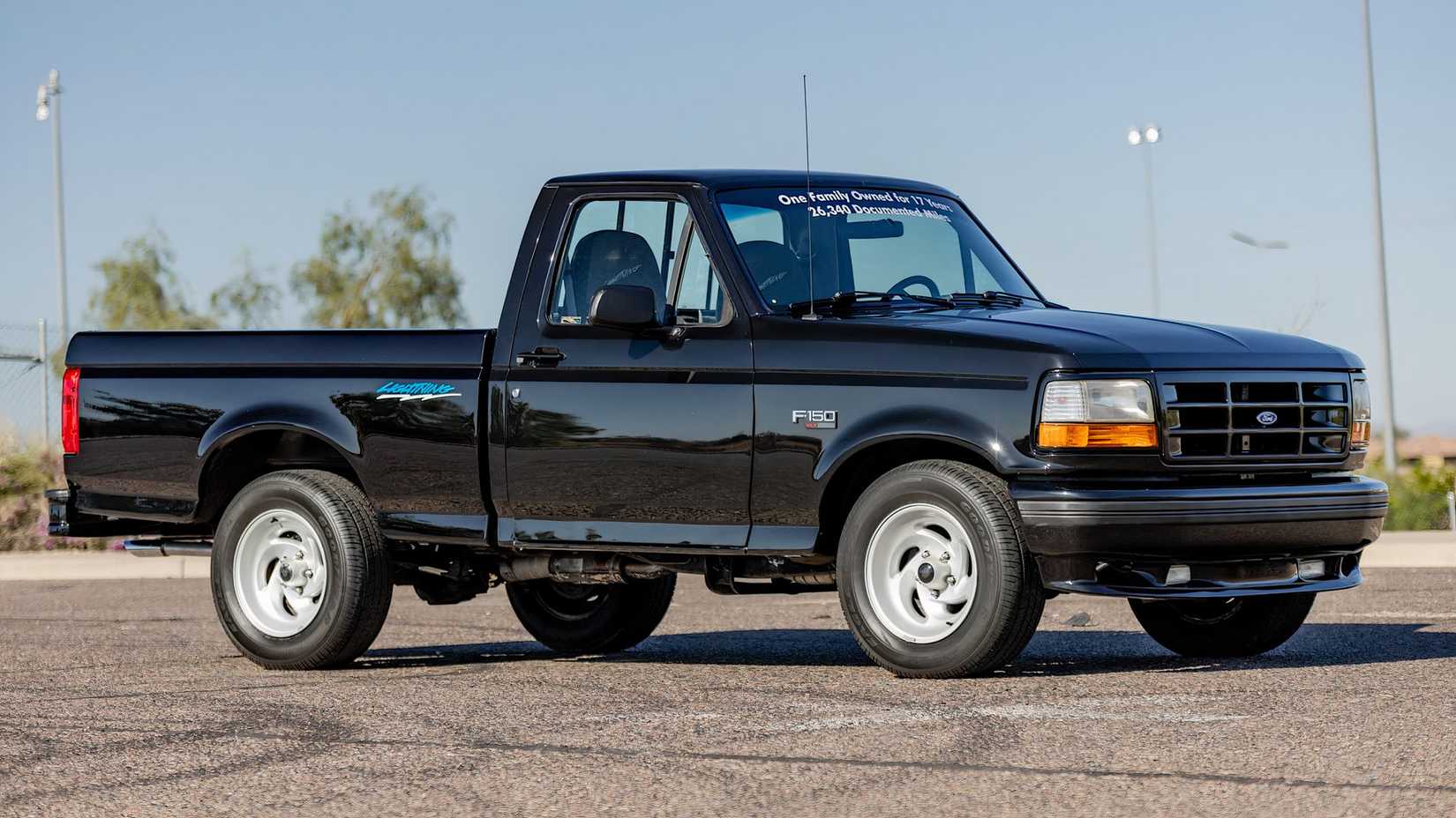 1994 Ford F-150 SVT Lightning in black parked