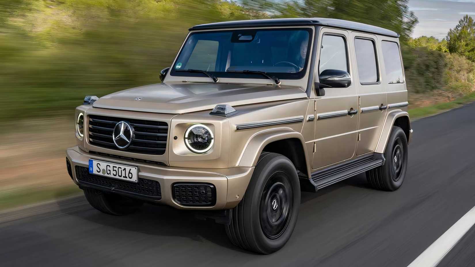 2025 Mercedes-Benz G550 in gold driving on road