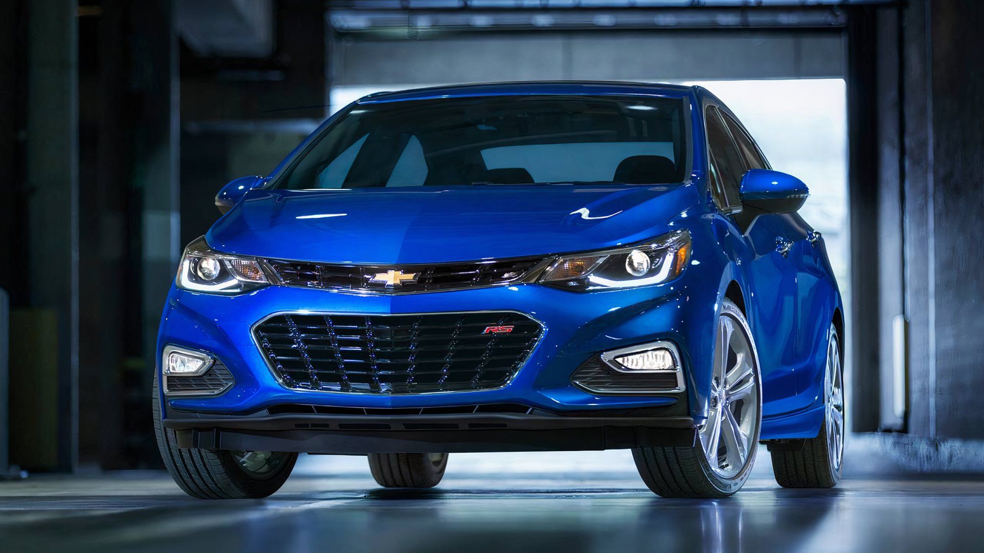 2018 Chevrolet Cruze in blue parked in warehouse