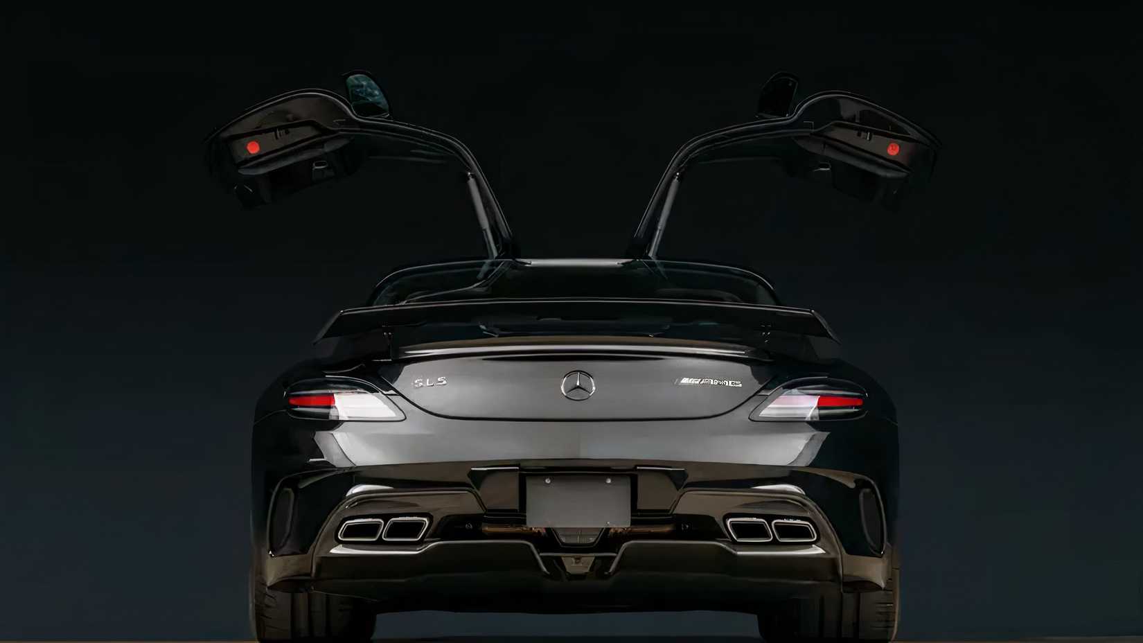 2014 Mercedes-AMG SLS Black Series in black parked in studio with both gull wing doors open