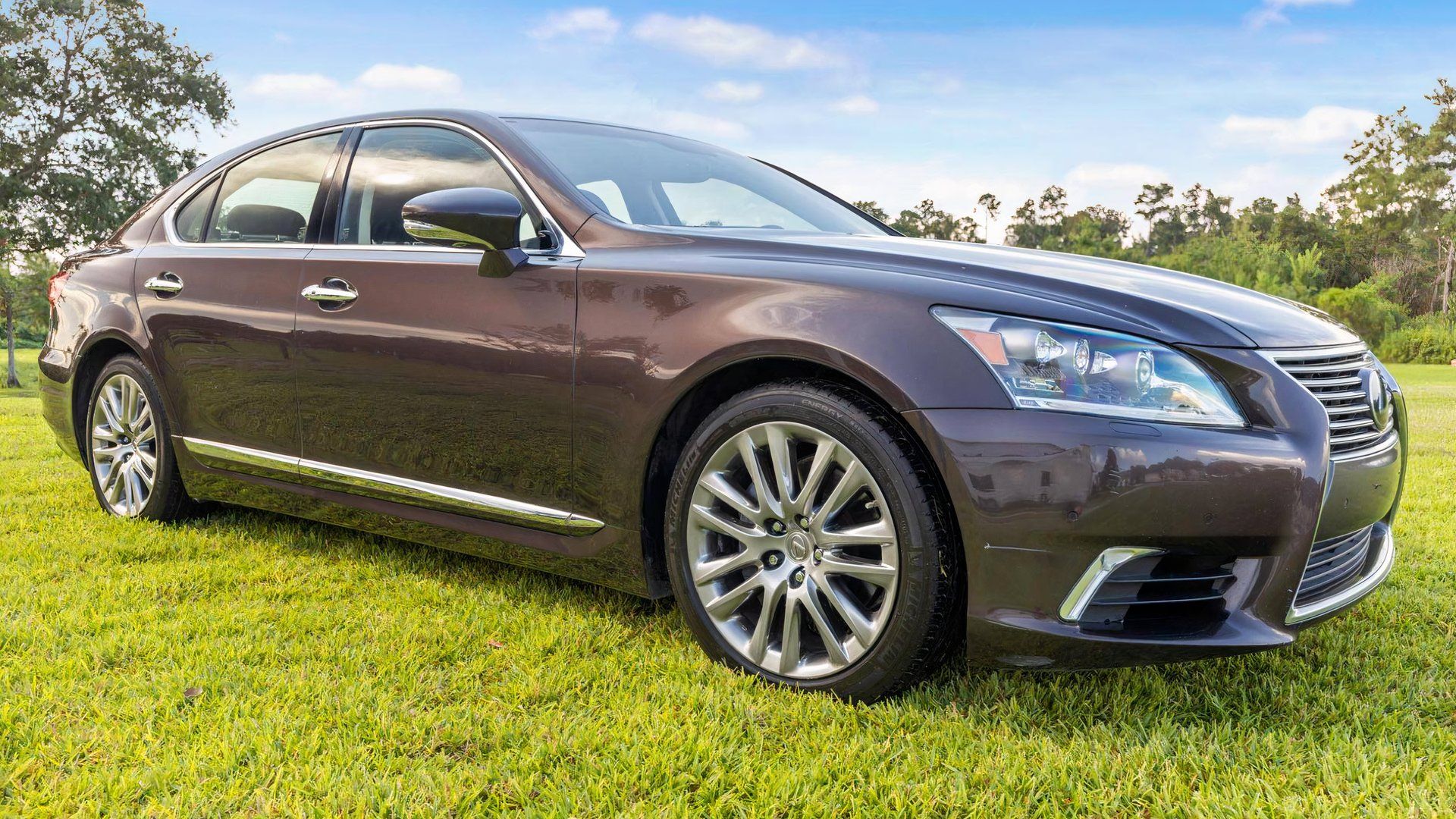 2014 Lexus LS460 parked on grass
