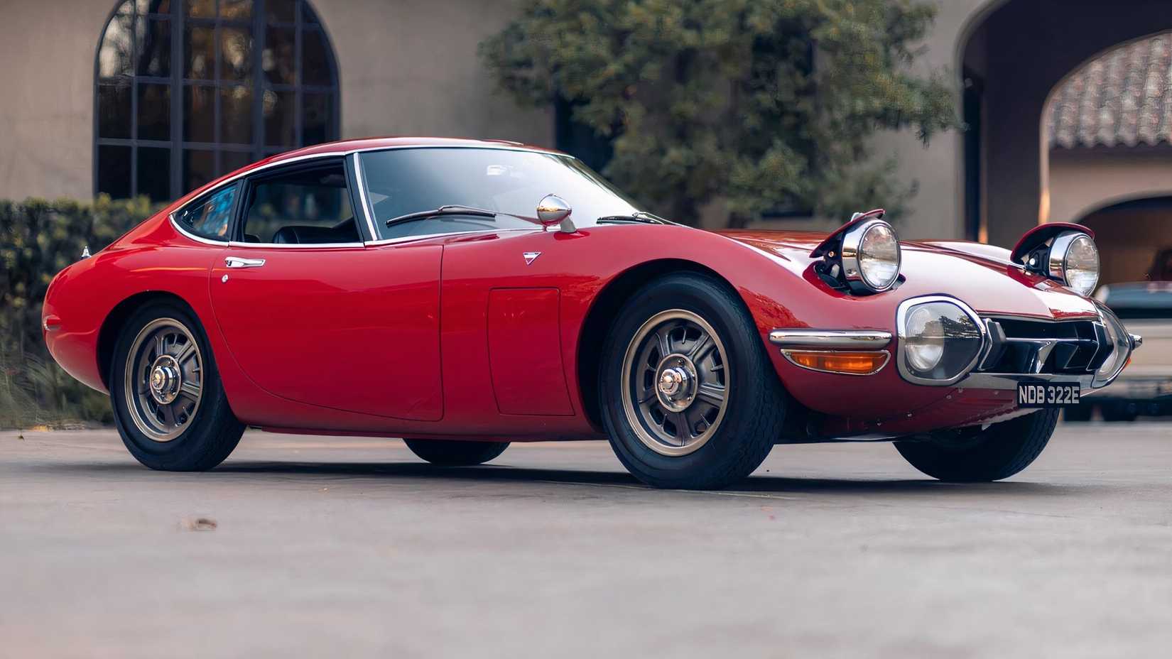 1967 Toyota 2000GT in red parked