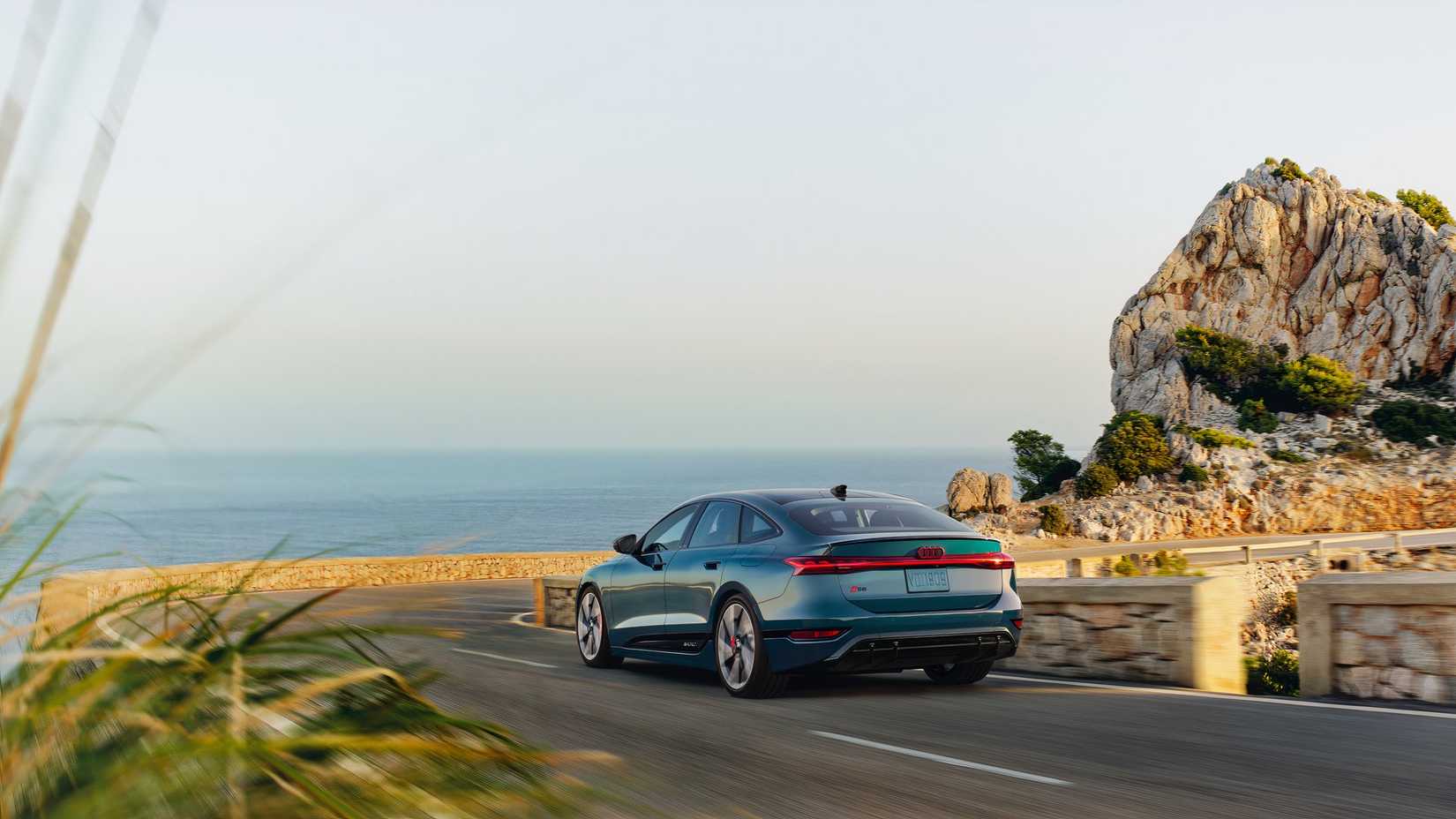 2025 Audi A6 Sportback e-Tron rear 3/4 action