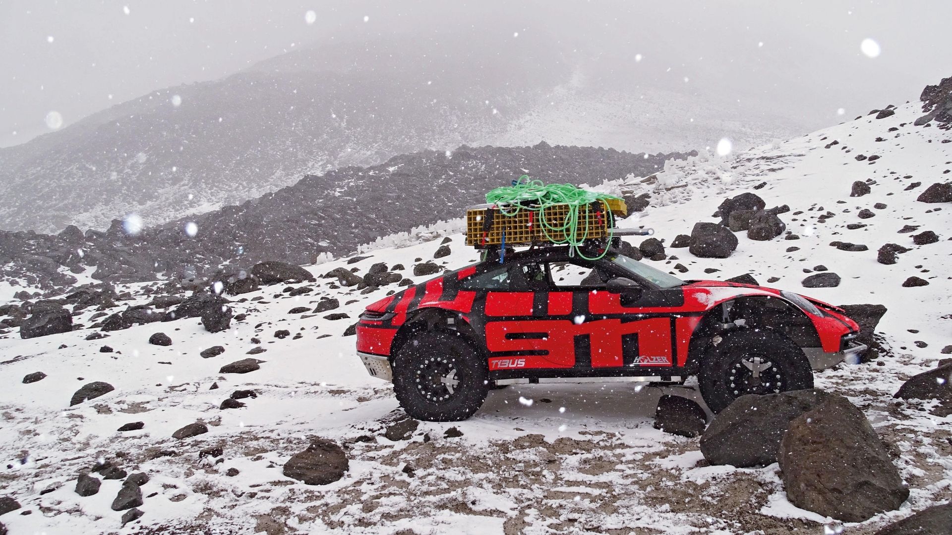 Watch Porsche Drive A 911 Sports Car To The Top Of The World's