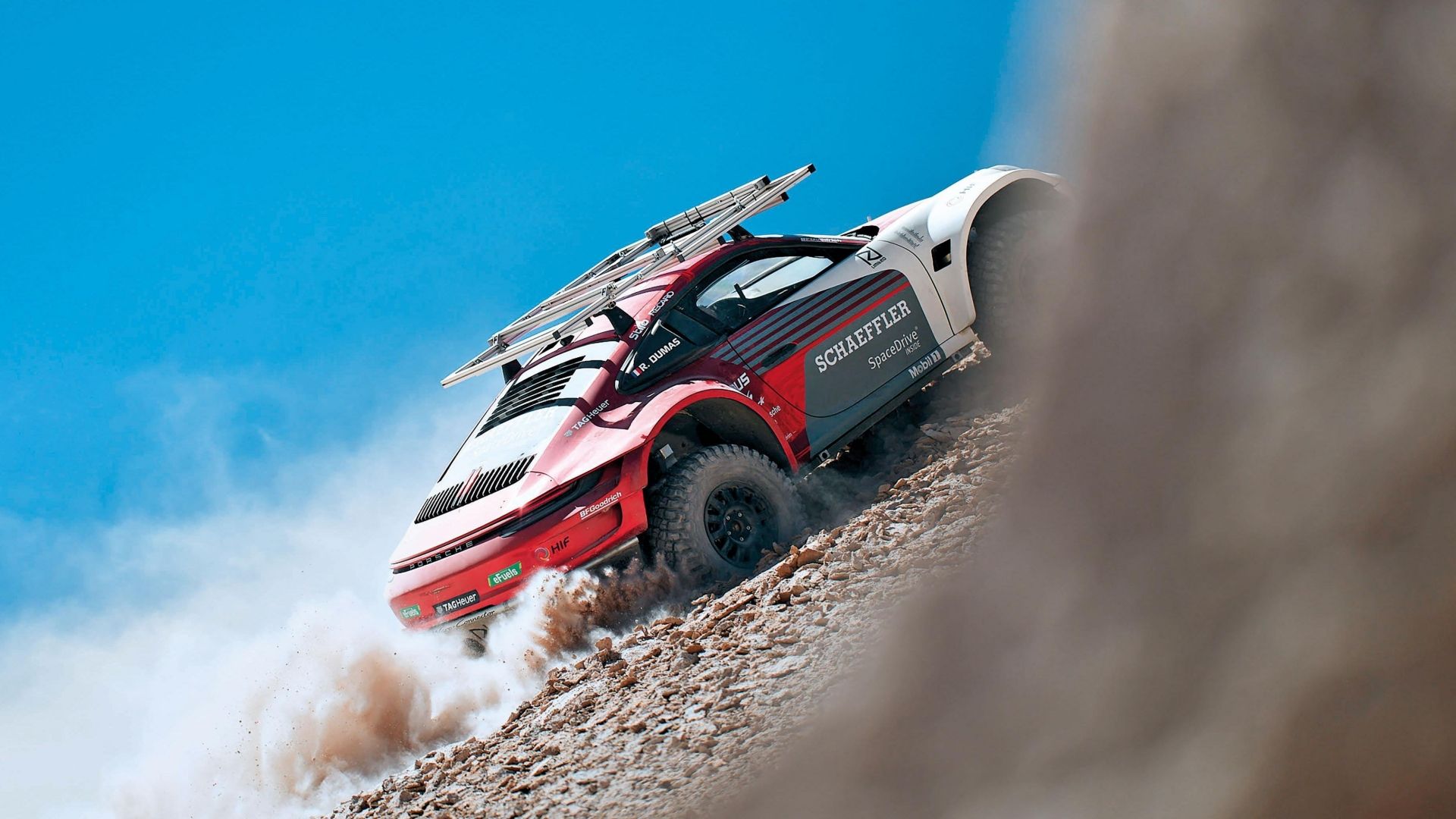 Watch Porsche Drive A 911 Sports Car To The Top Of The World's
