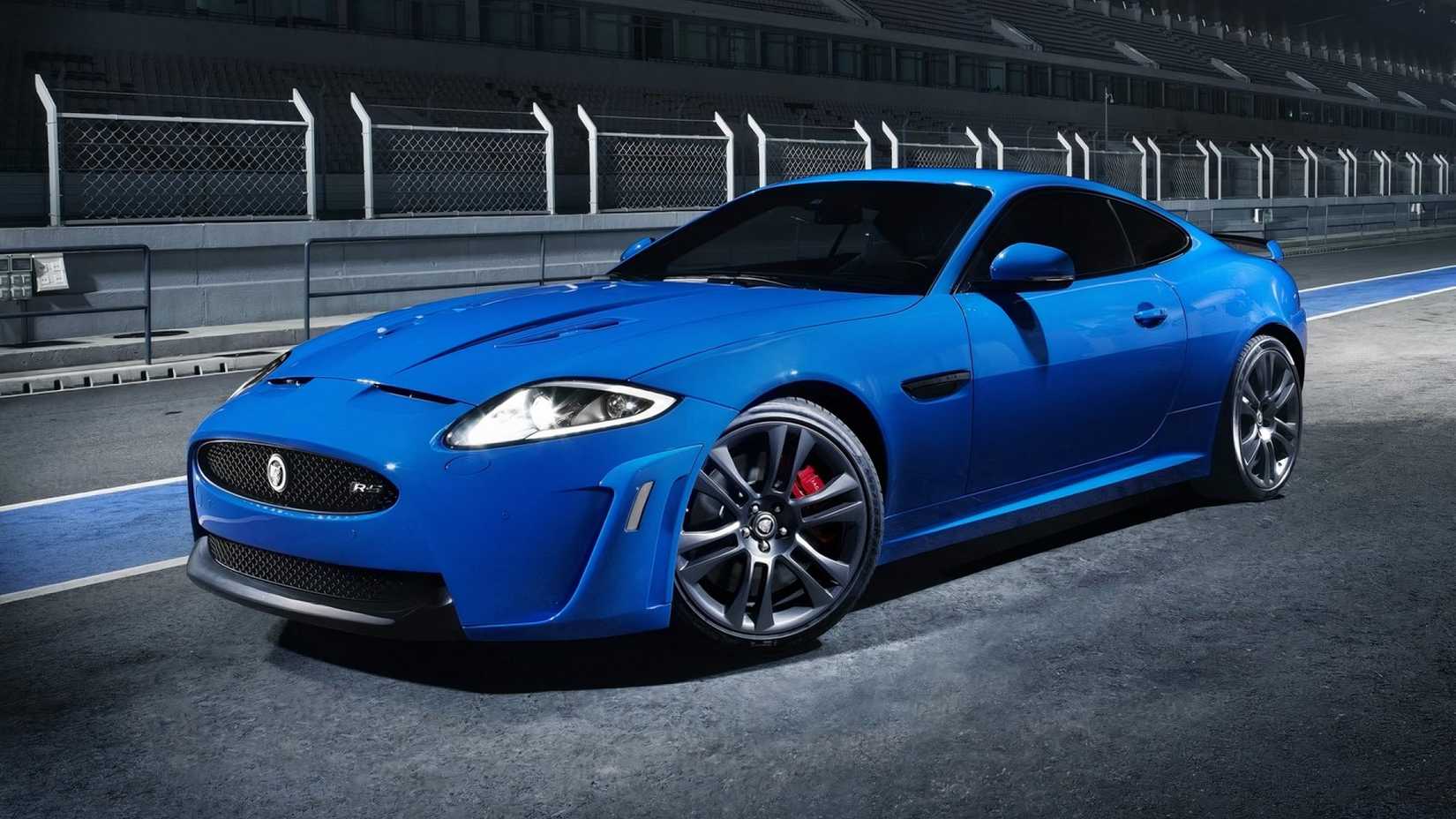 Front 3/4 shot of a blue 2012 Jaguar XKR-S parked at track