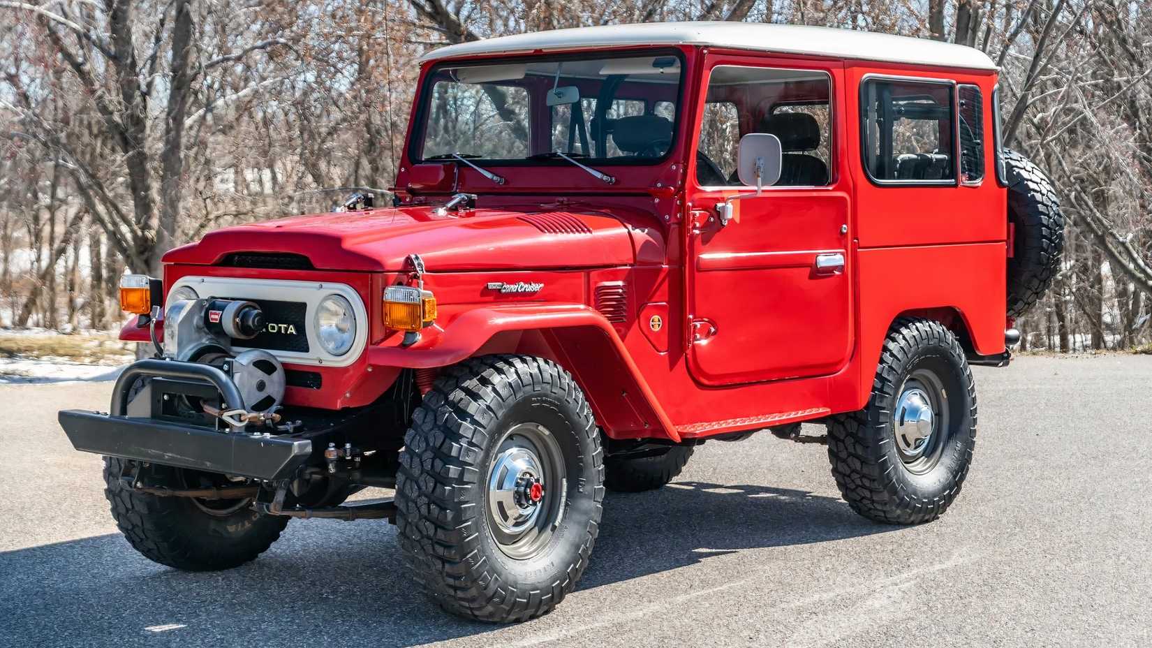 Front 3/4 shot of a 1978 Toyota Land Cruiser parked in a lot