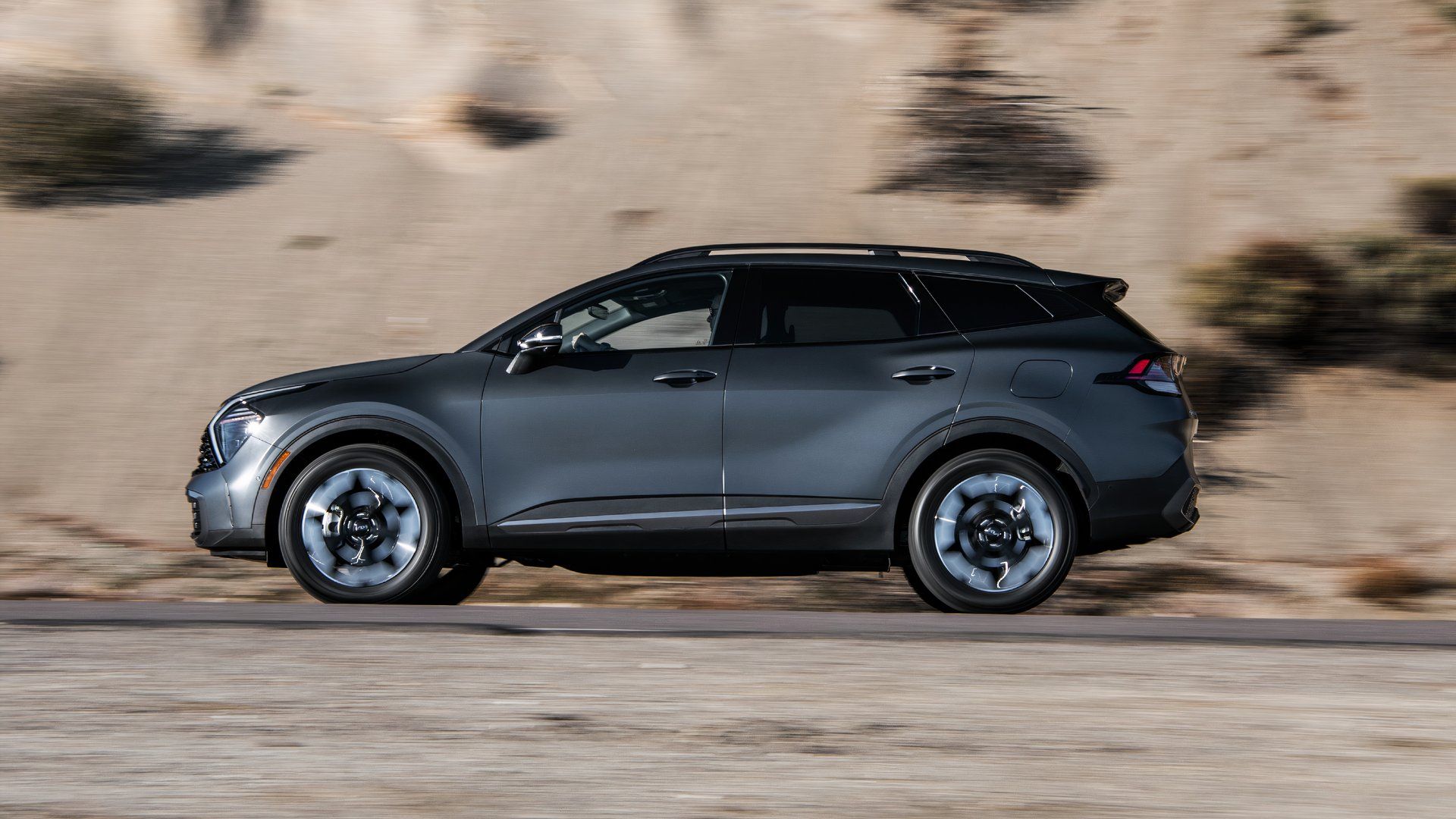 Side profile shot of a 2025 Kia Sportage PHEV
