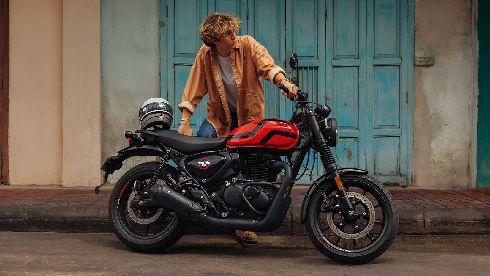 2025 Royal Enfield Hunter 350 in orange lifestyle shot
