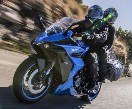 2025 Suzuki GSX-S1000GT+ sports tourer accelerating front third quarter view