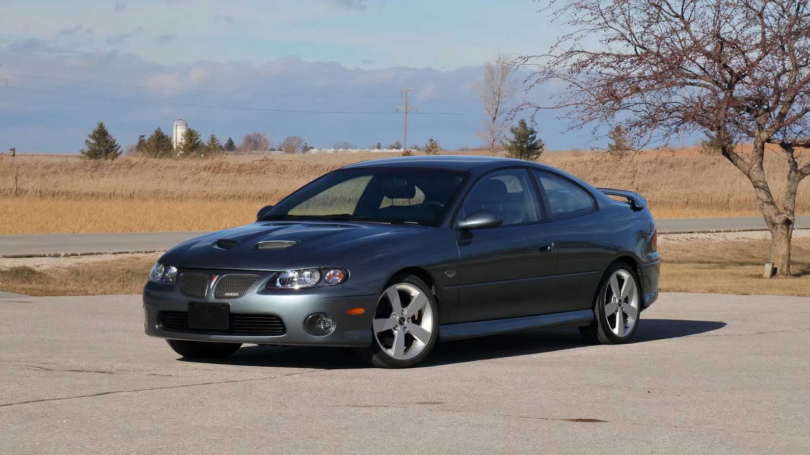 2005 Pontiac GTO in blue parked in parking lot