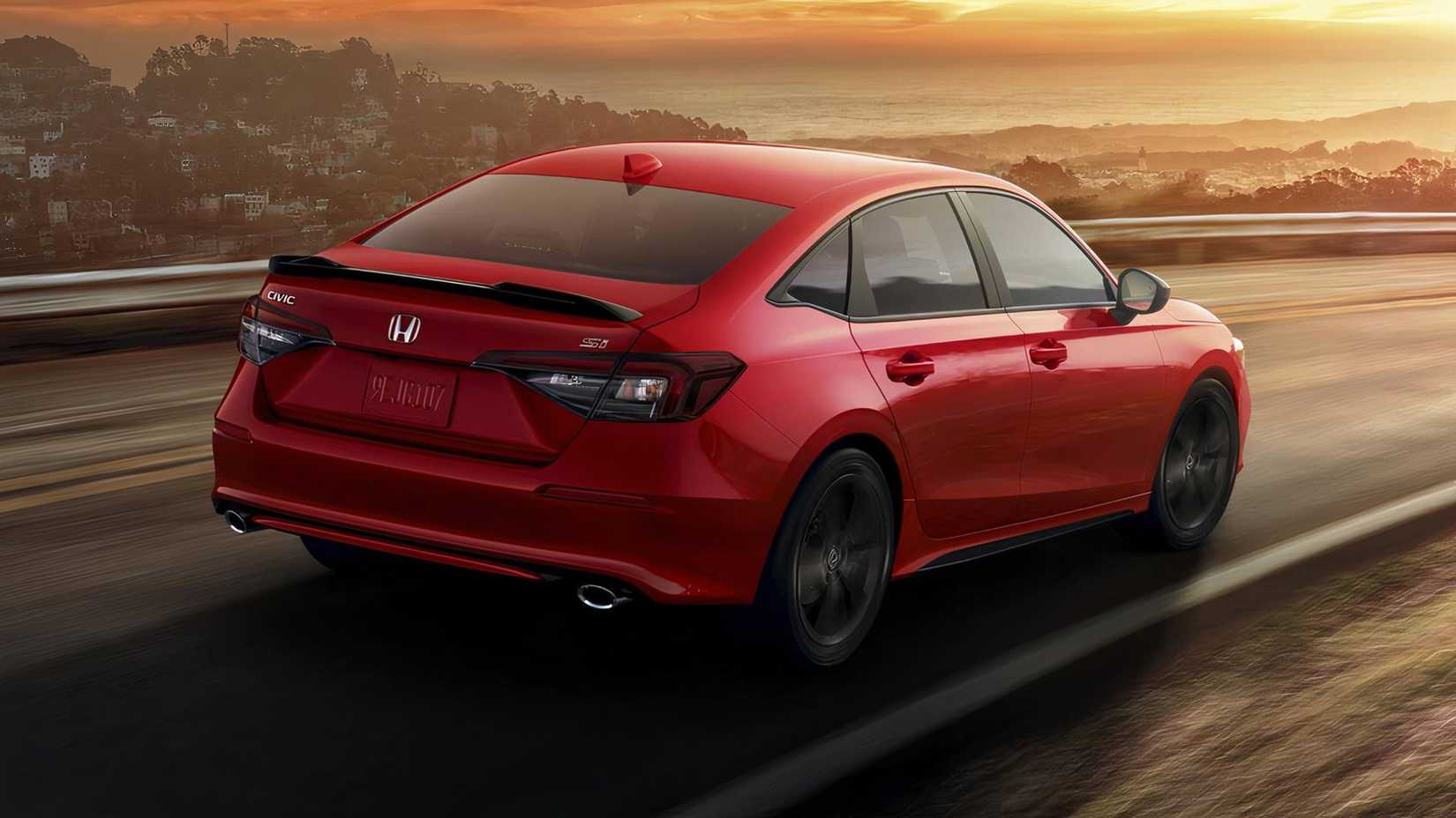 2025 Honda Civic Si in red driving on coast road