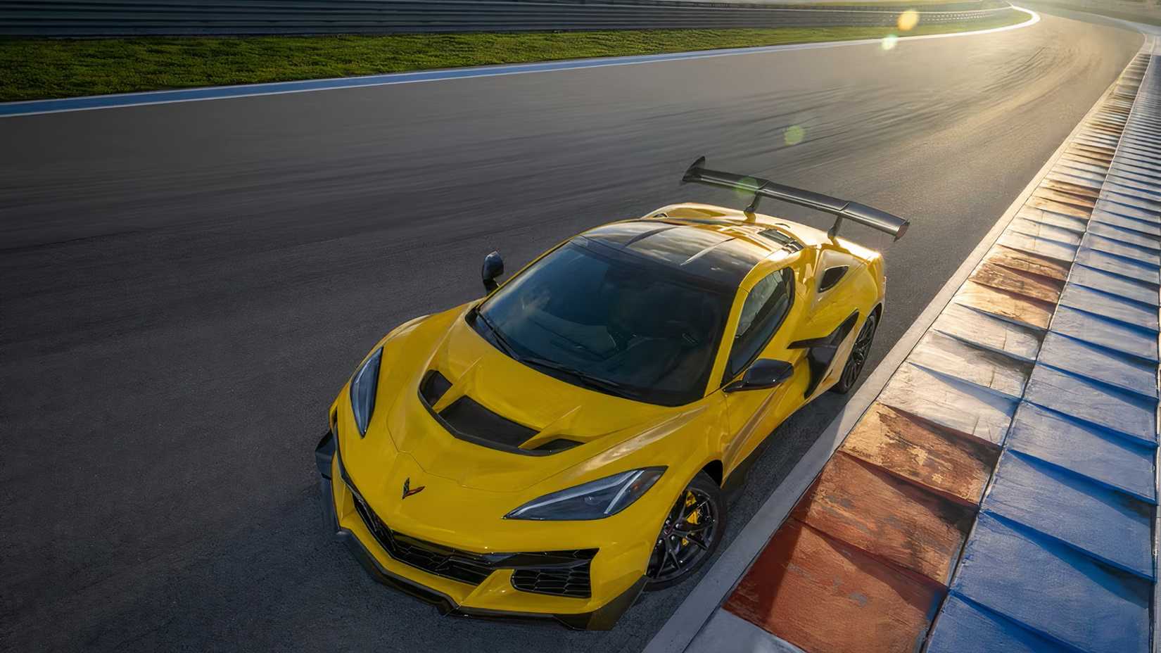 2025 Chevrolet Corvette ZR1 Coupe in yellow driving on racetrack