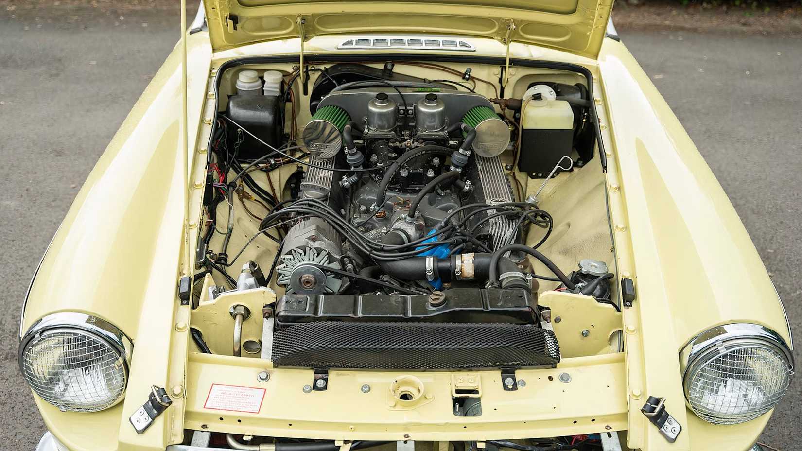 1975 MG B Roadster V8 with hood up showing engine bay