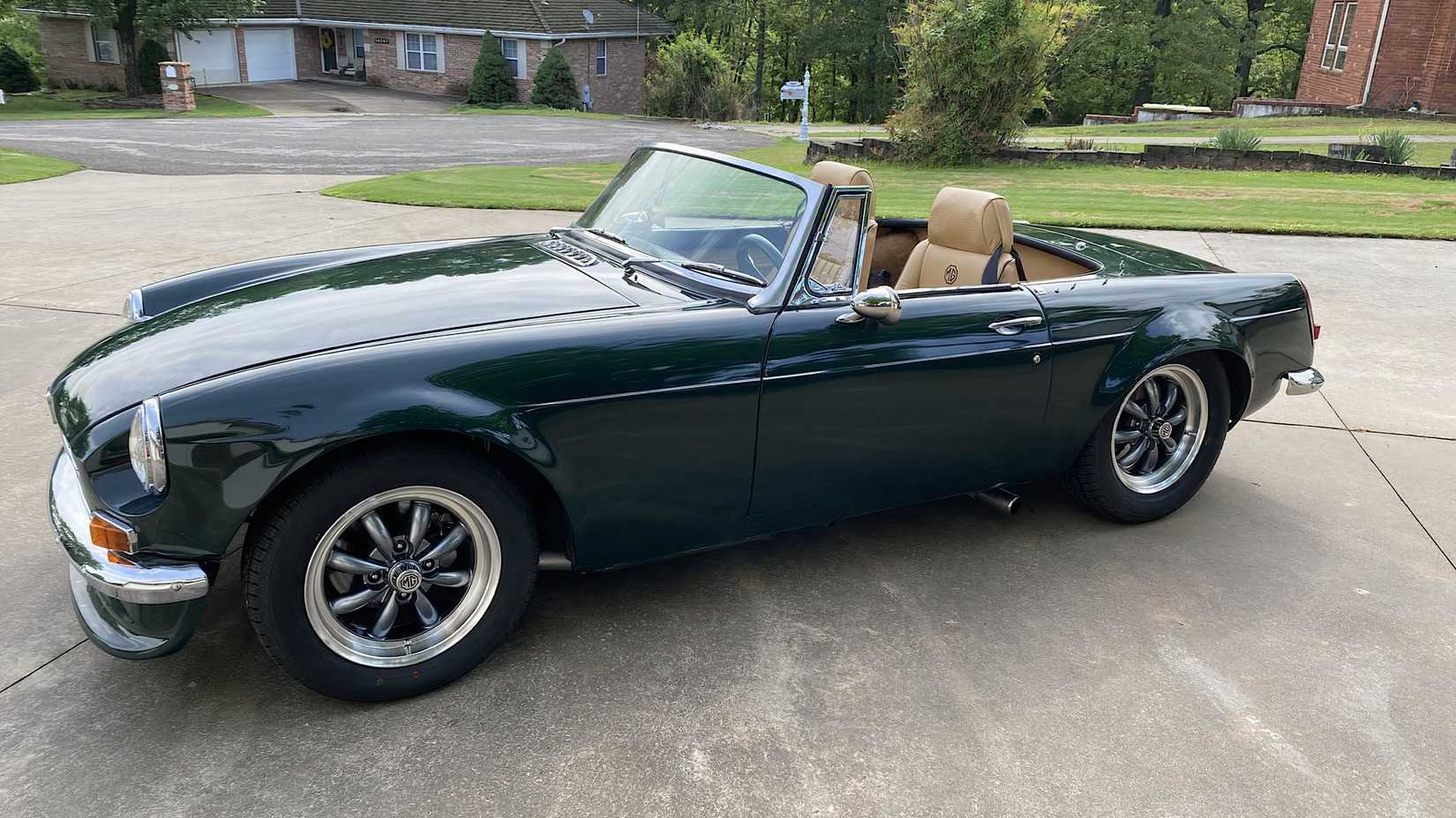 1967 MG MGB Roadster in green parked on driveway