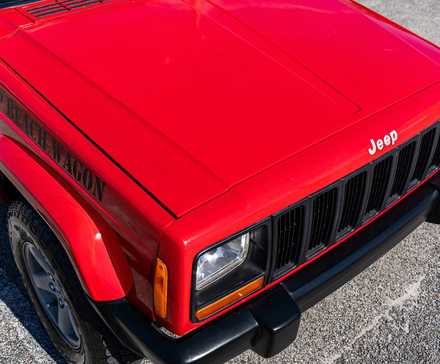1998 Jeep Cherokee XJ front end showing hood and grille