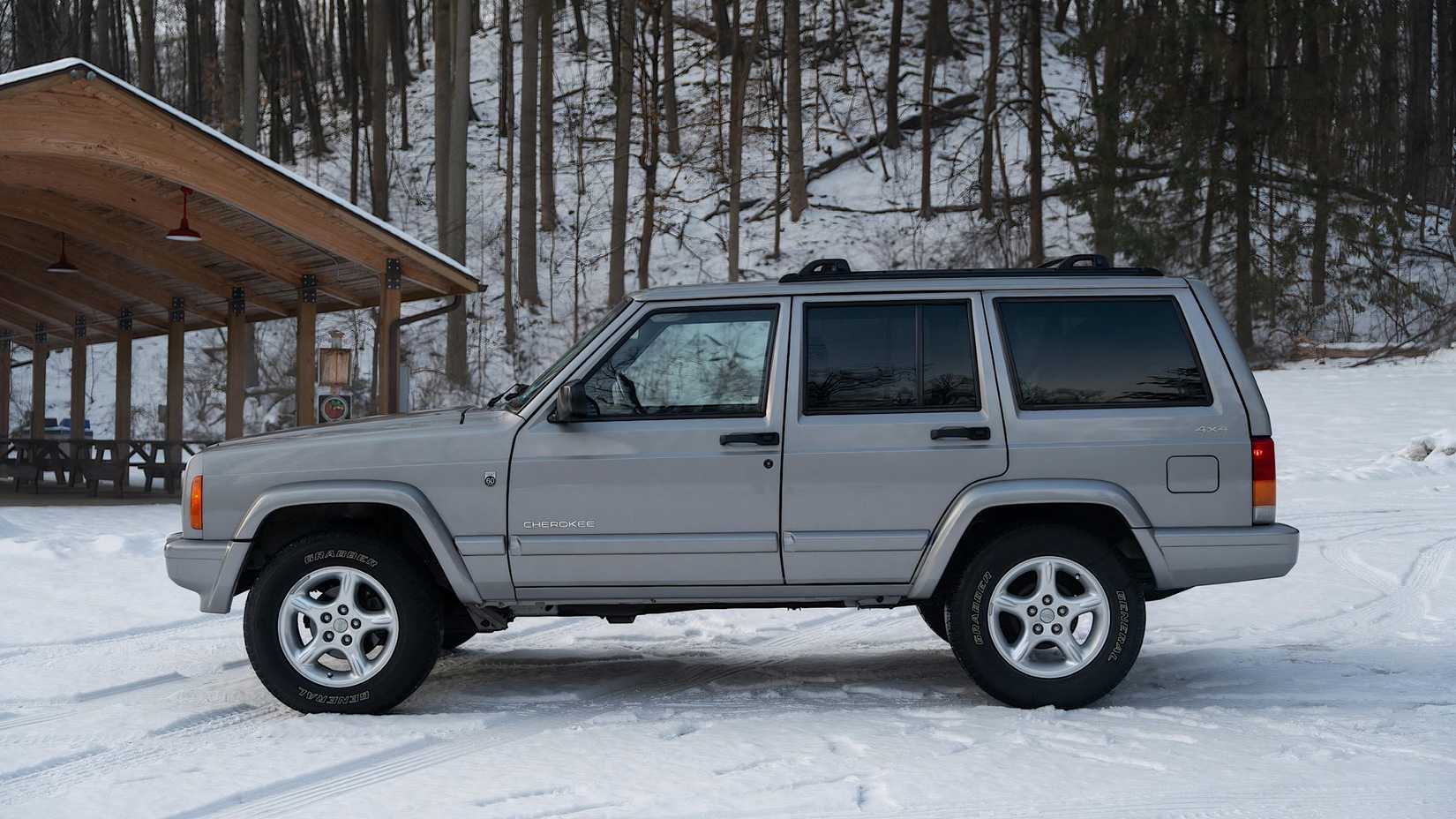 2001 Jeep Cherokee 60th Anniversary Edition in gray parked in snow