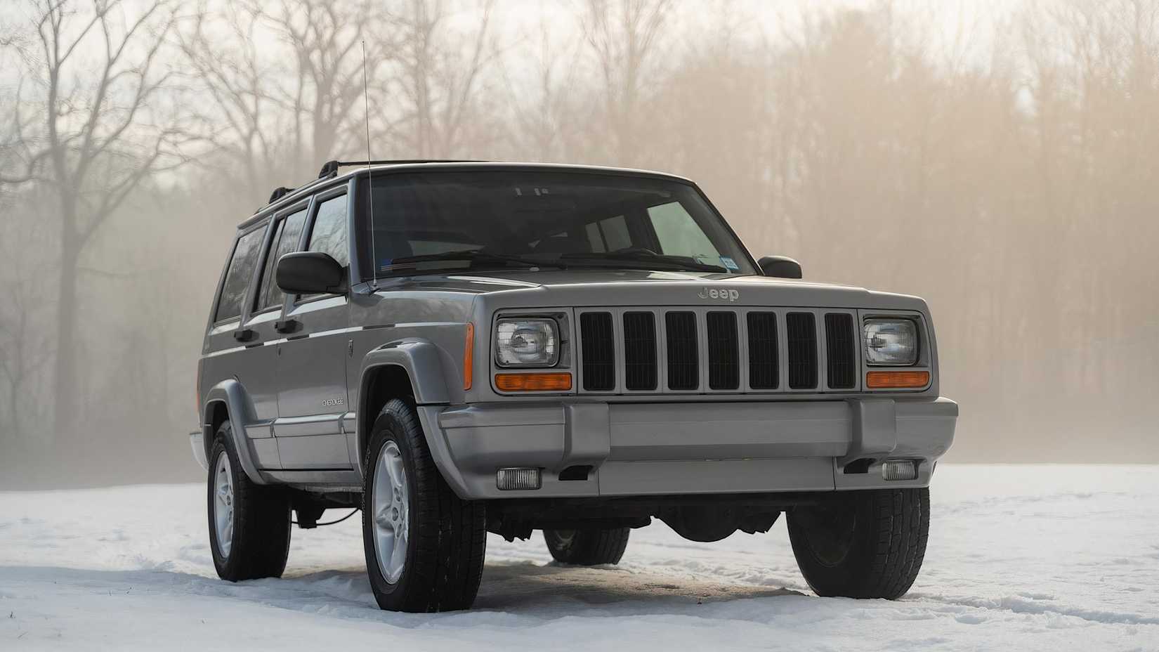 2001 Jeep Cherokee 60th Anniversary Edition in gray parked in snow