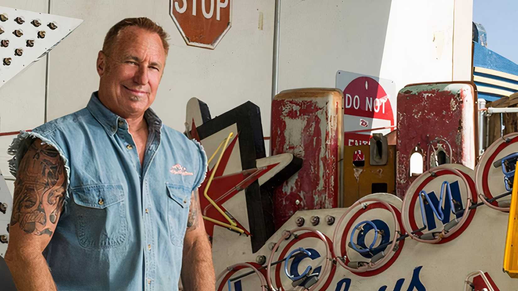 Rick Dale stood in front of signs
