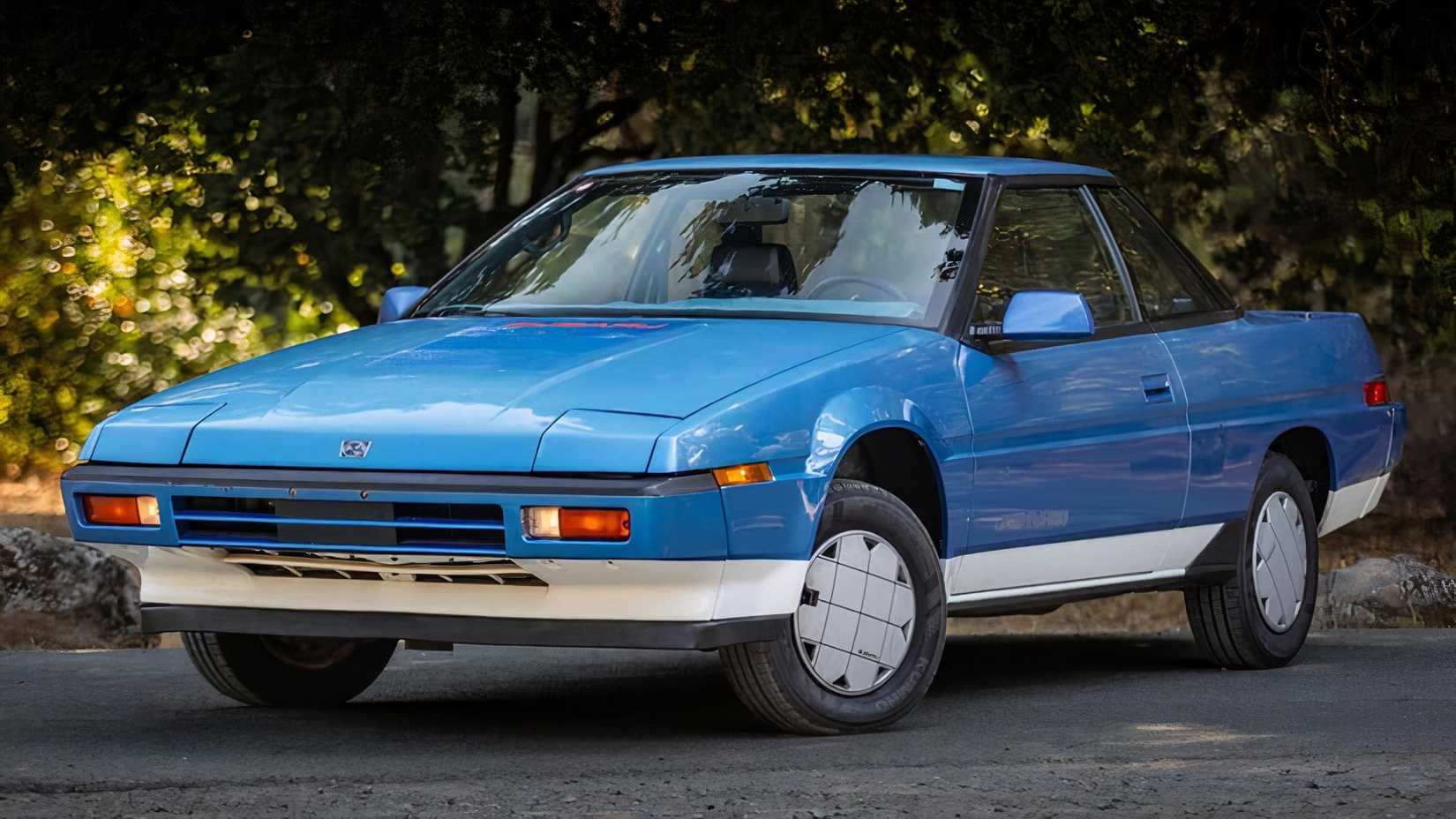1985 Subaru XT GL in blue parked in parking lot