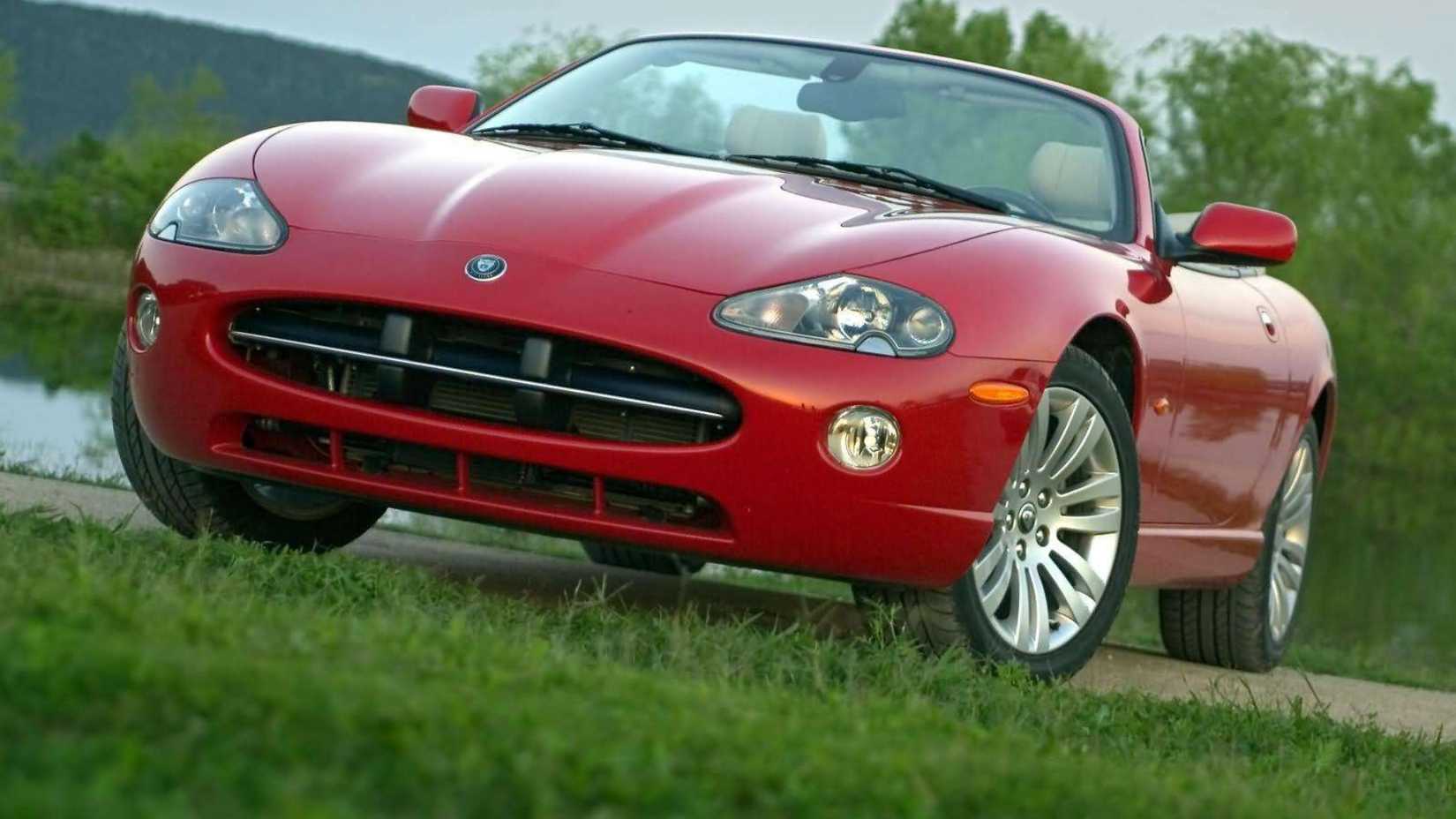 Front shot of a 2005 Jaguar XK8 Convertible parked in grass