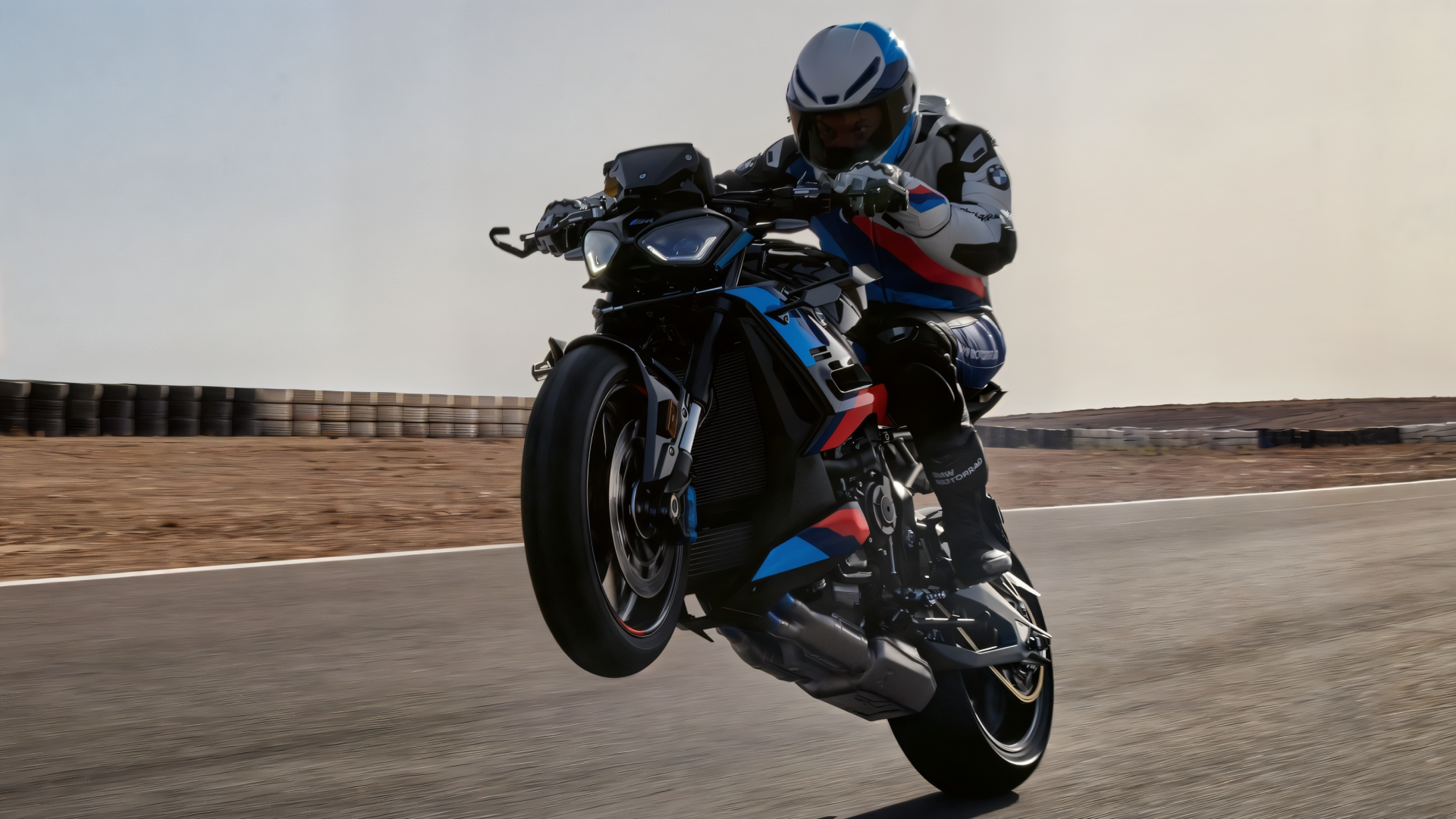 2025 BMW M 1000 R popping a wheelie