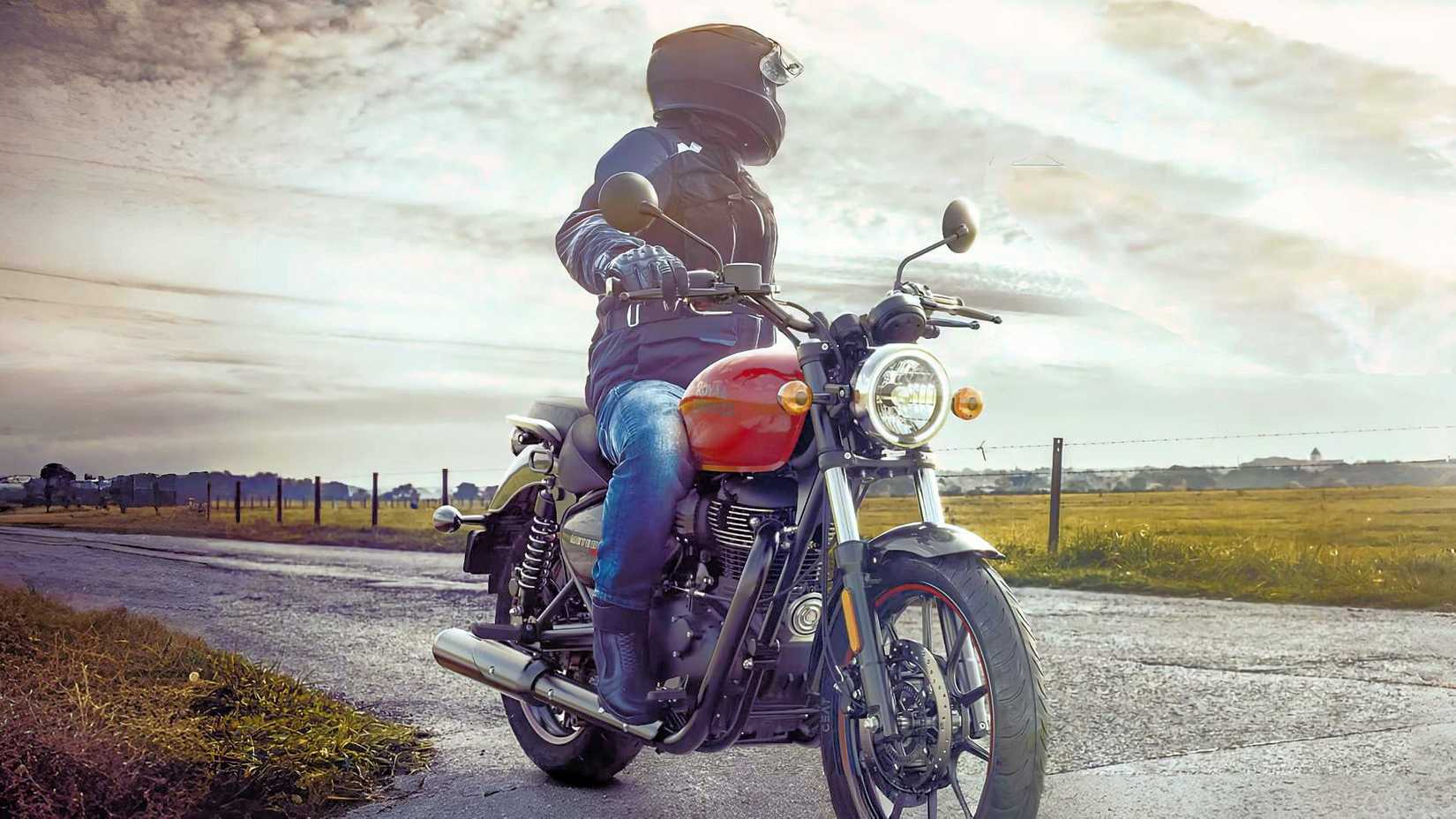 Rider sits on a 2023 Royal Enfield Meteor 350