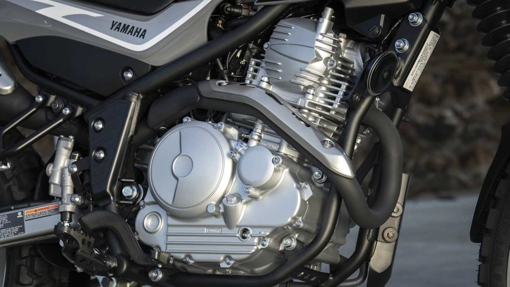 A close-up shot of the XT250's engine