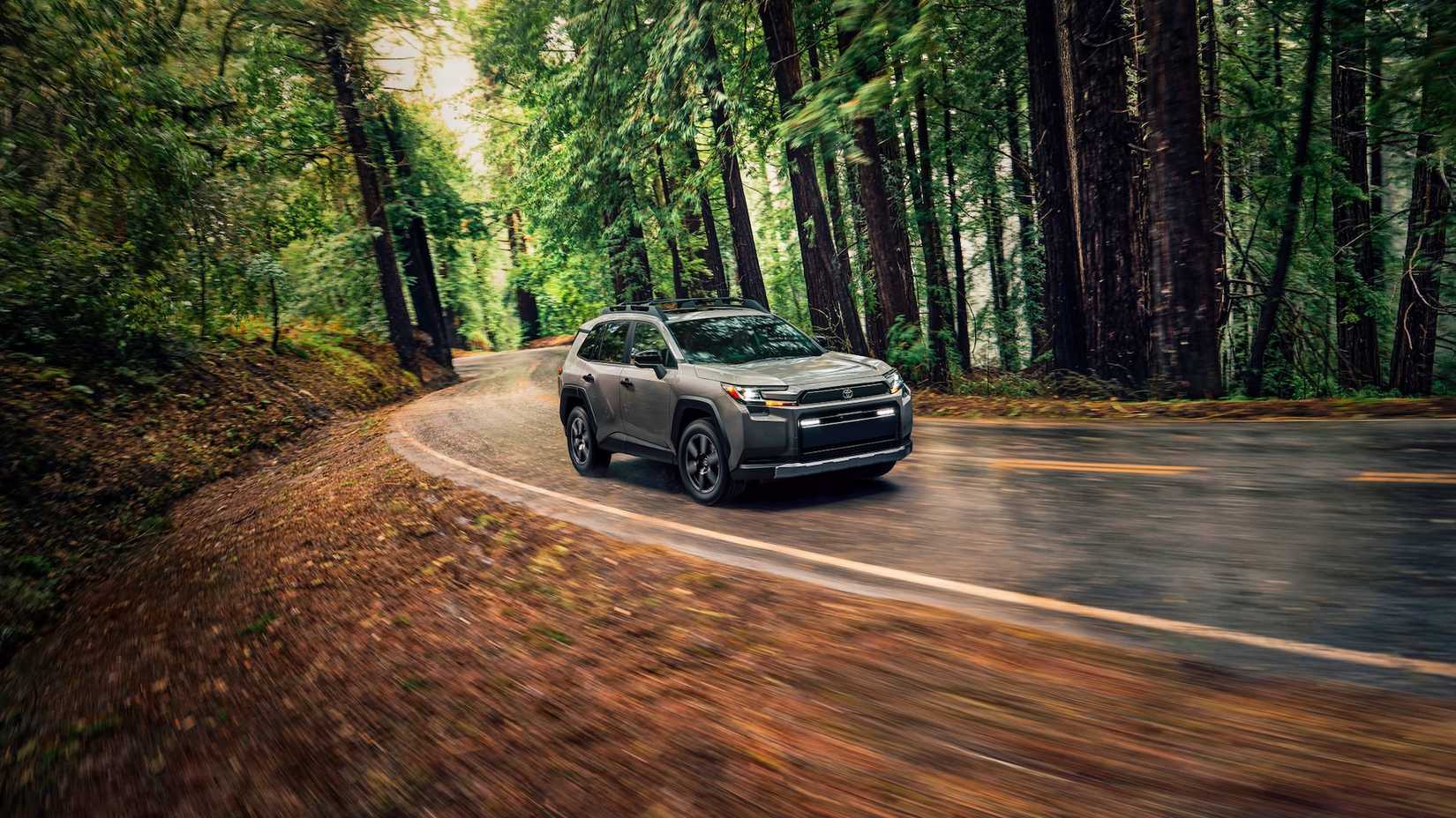 2026 Toyota RAV4 Woodland front driving on road
