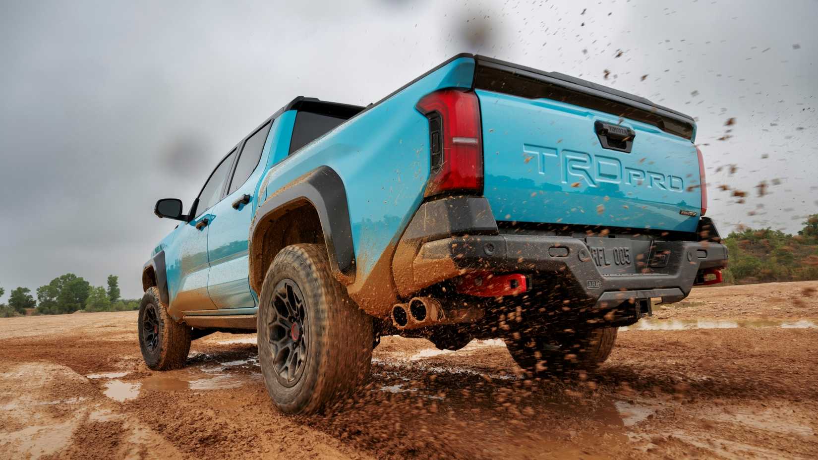 2026 Toyota TRD Pro Wave Maker Blue Paint Tacoma Driving Rear