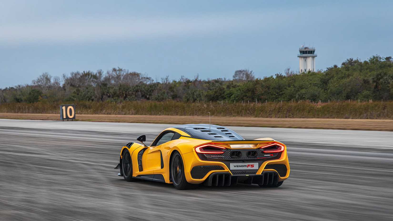 2025 Hennessey Venom F5 Evolution in yellow driving on track