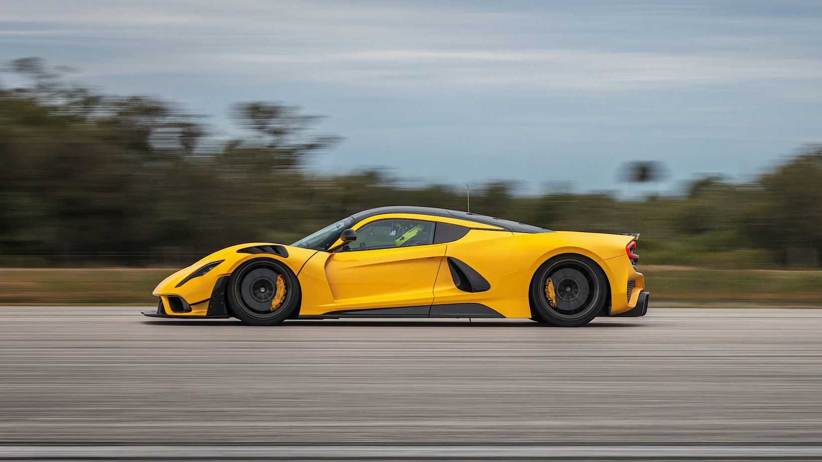2025 Hennessey Venom F5 Evolution in yellow driving on track