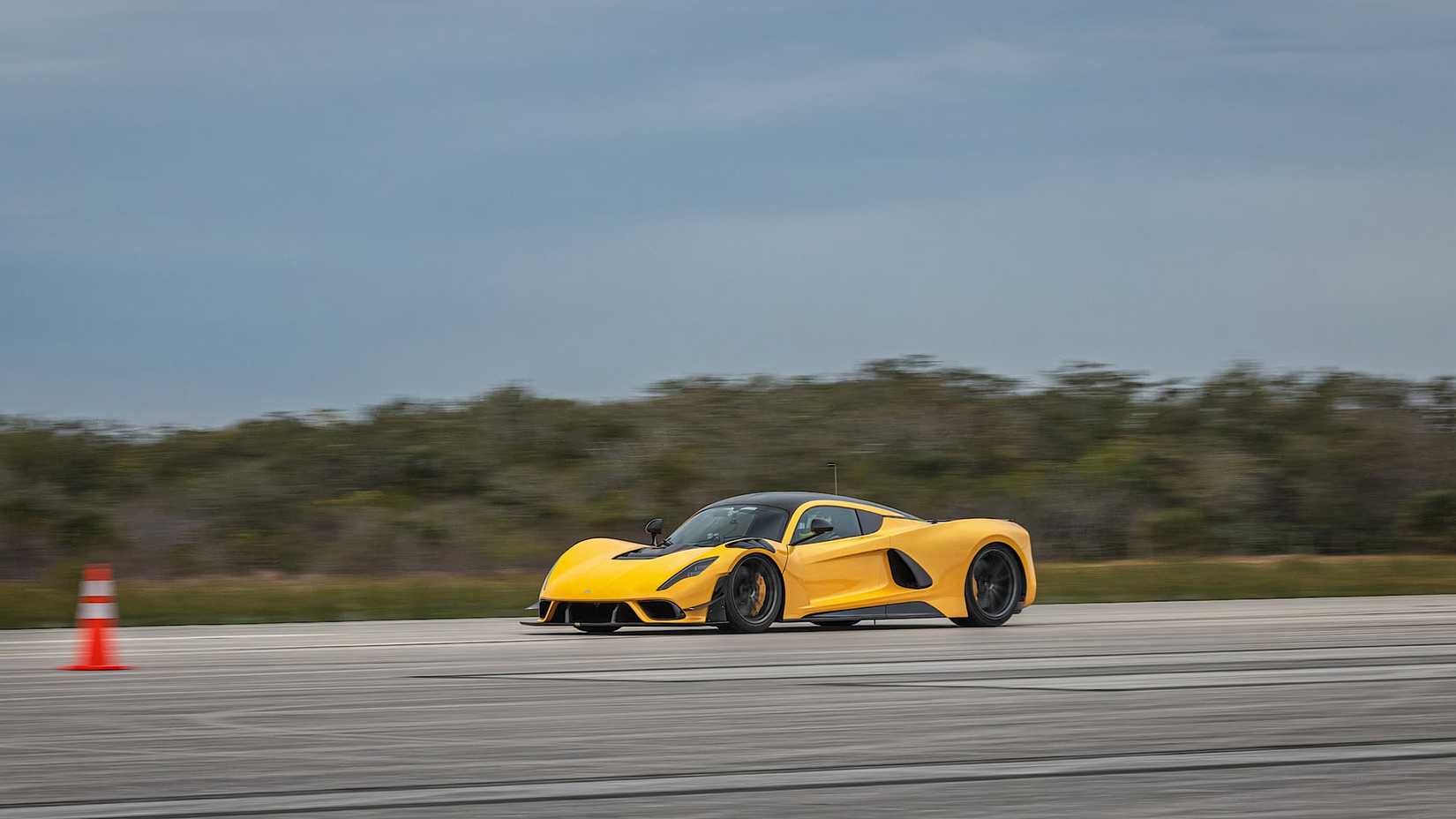 2025 Hennessey Venom F5 Evolution in yellow driving on track