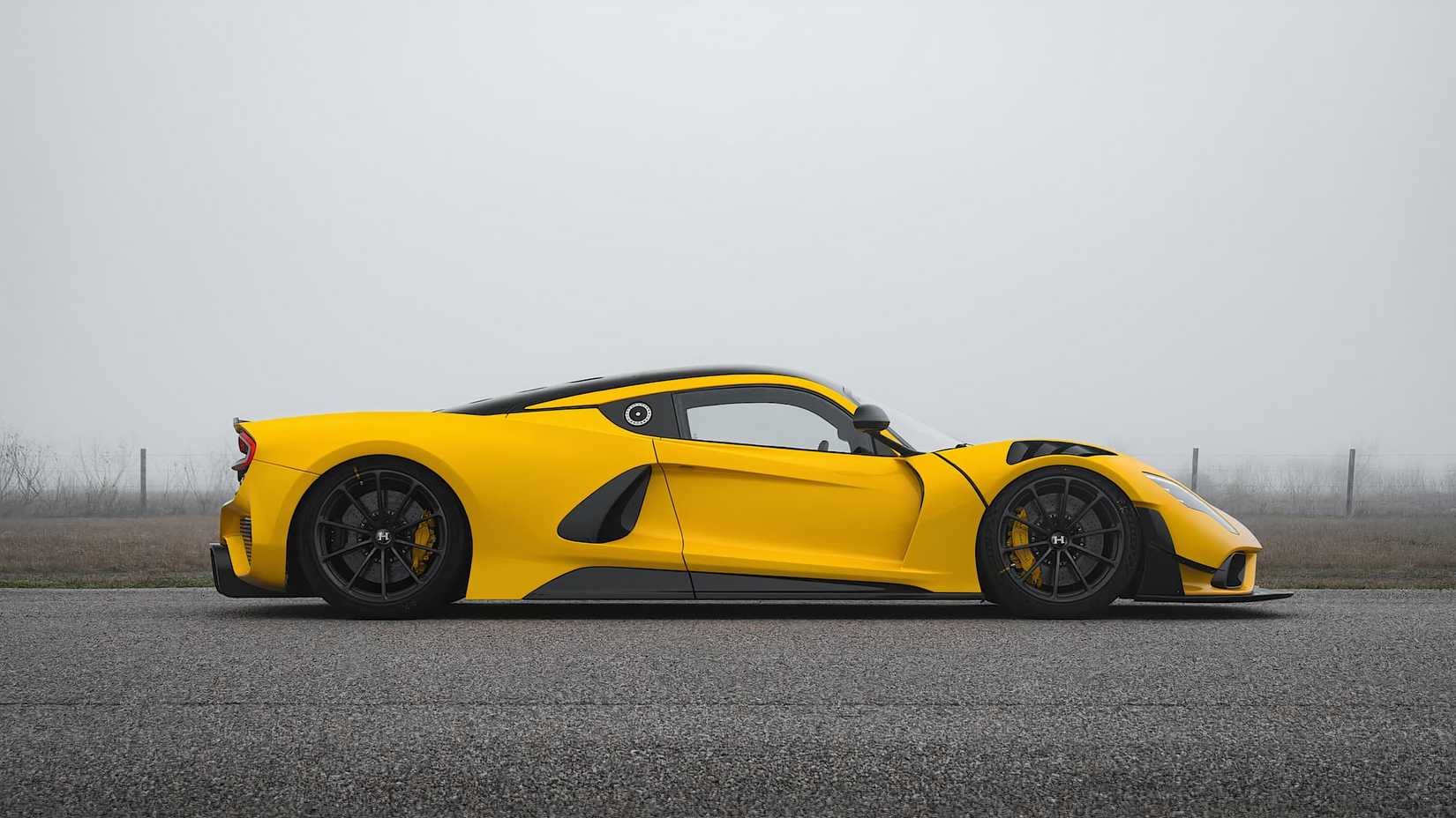 2025 Hennessey Venom F5 Evolution in yellow driving on road