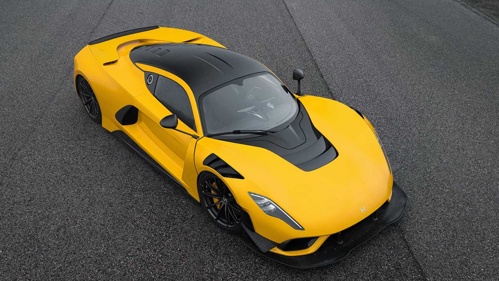 2025 Hennessey Venom F5 Evolution in yellow parked on track