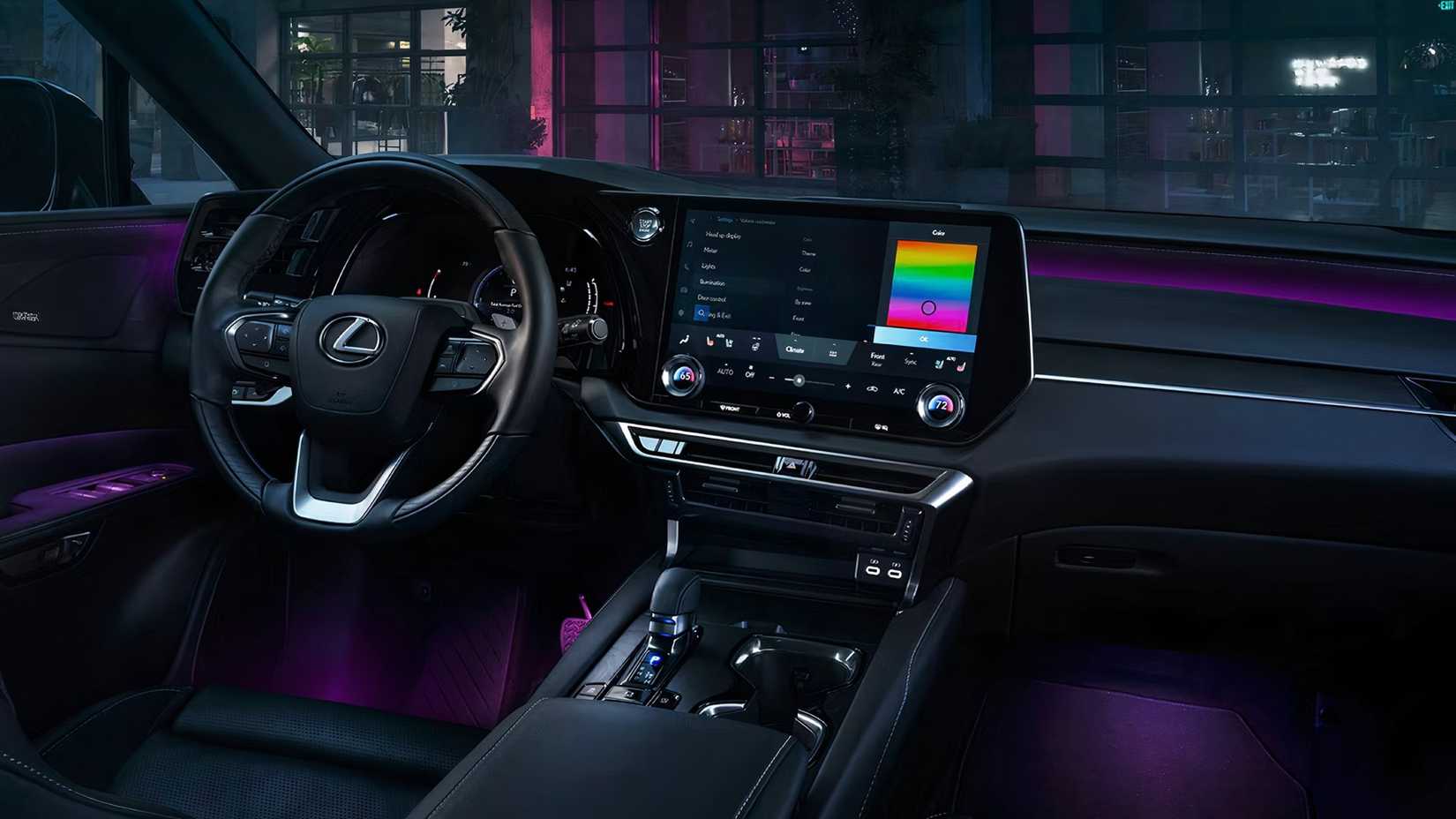 Interior do Lexus RX 2025 mostrando cabine dianteira, controles e volante