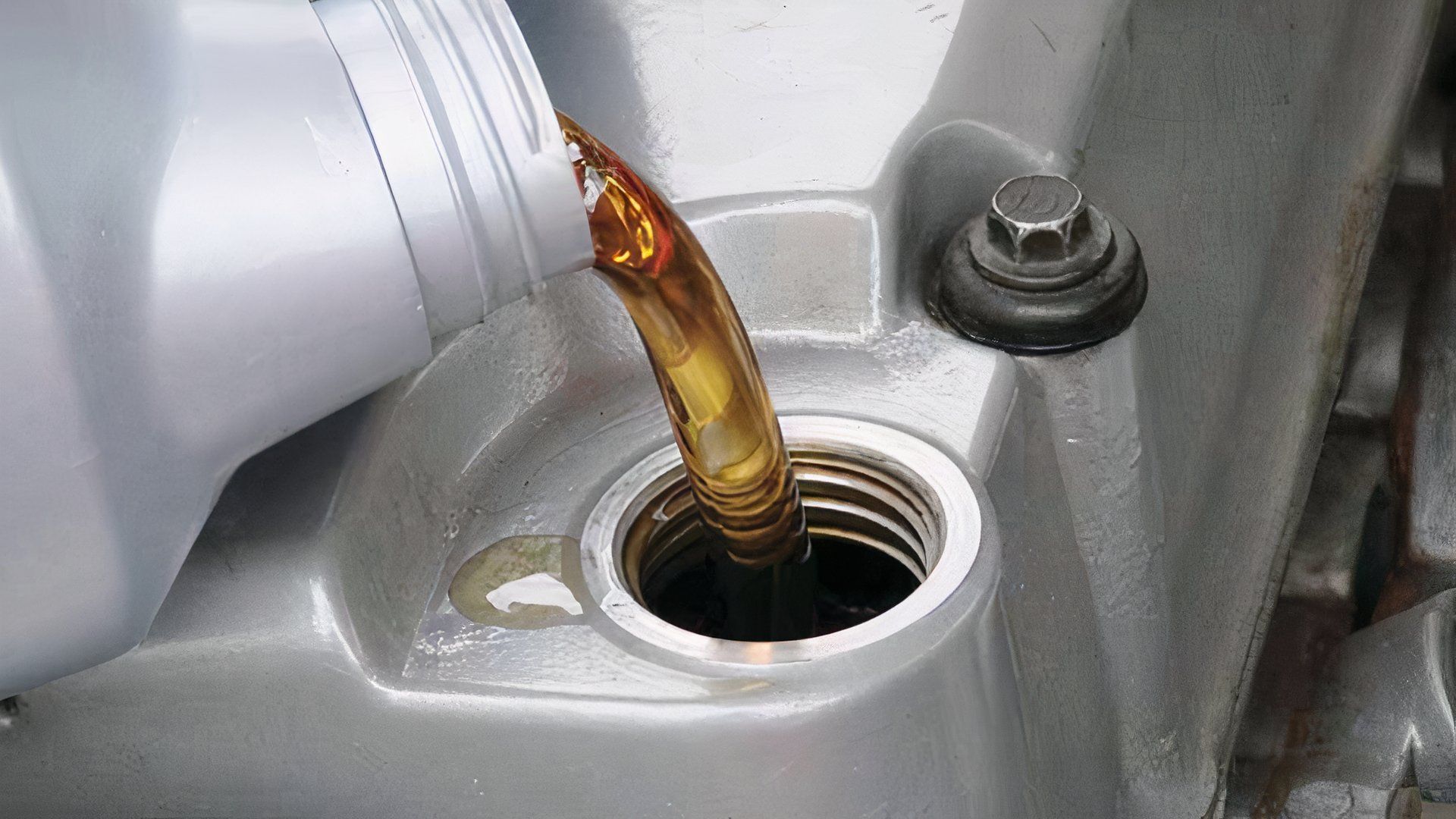 Oil being poured into engine