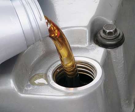 Oil being poured into engine
