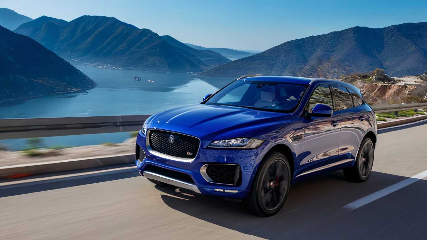 2017 Jaguar F-Pace S in blue driving on country road