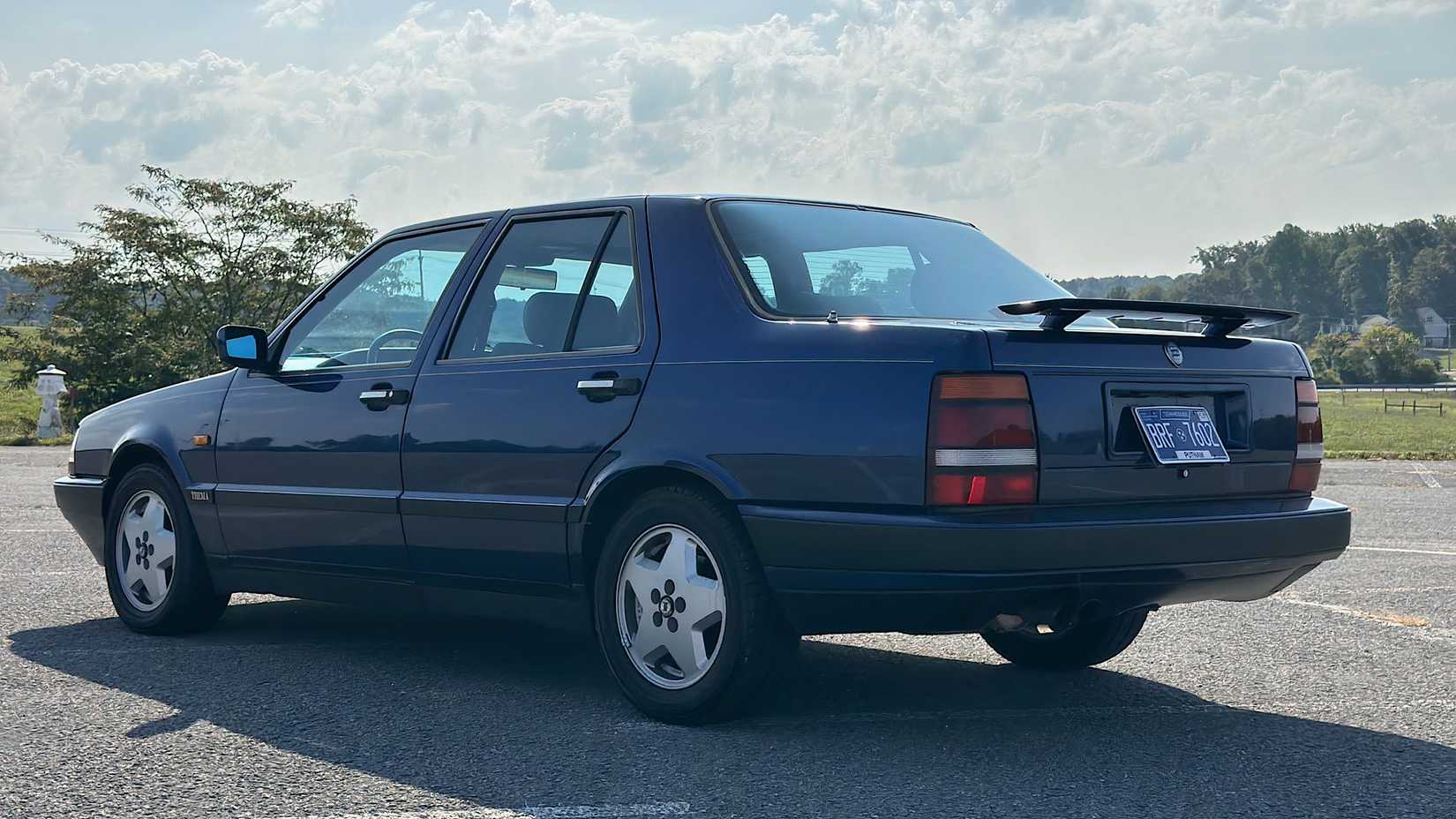 1990 Lancia Thema 3.82 in blue parked in parking lot