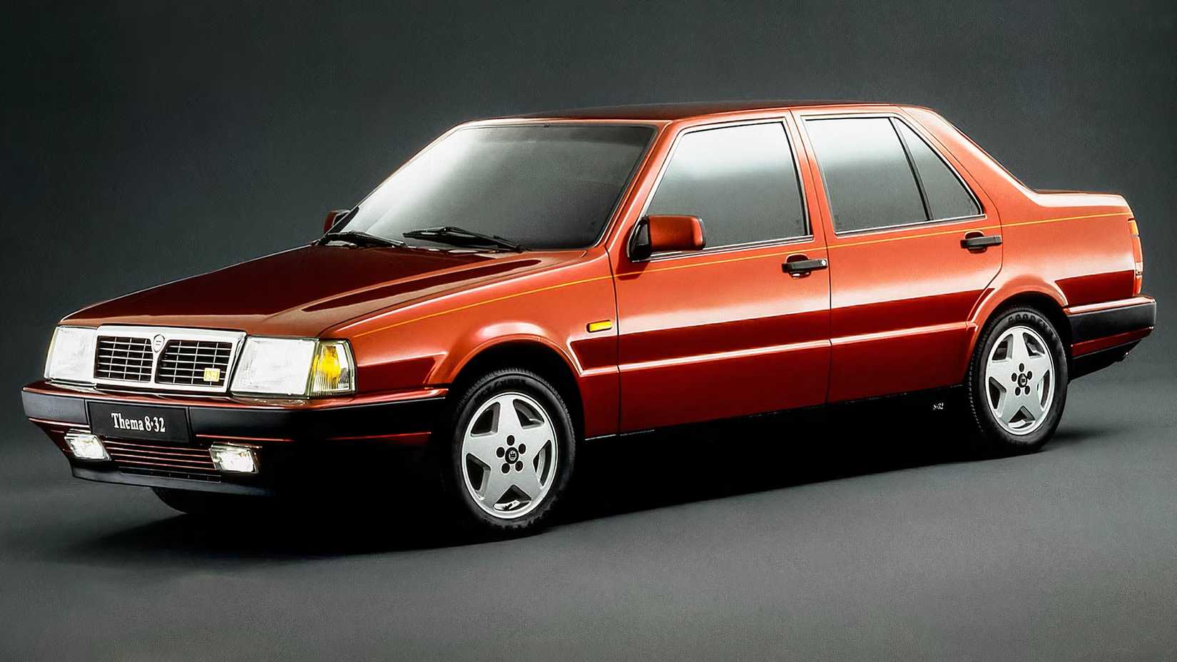 Lancia Thema 8.32 in red parked in studio