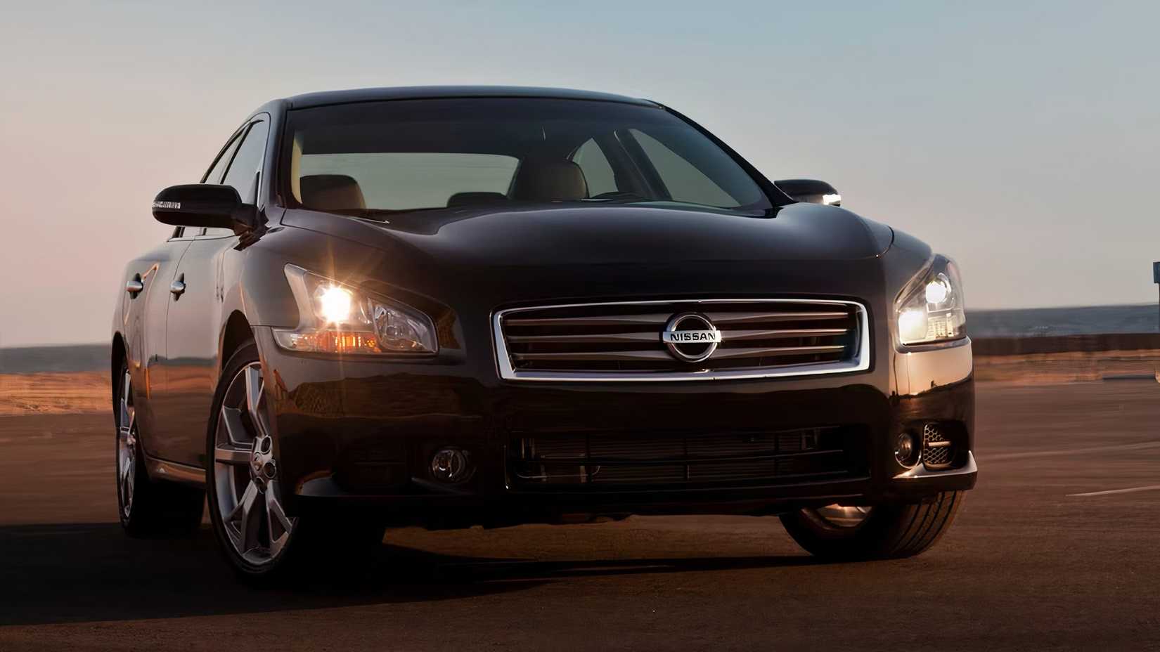 2014 Nissan Maxima in blue parked