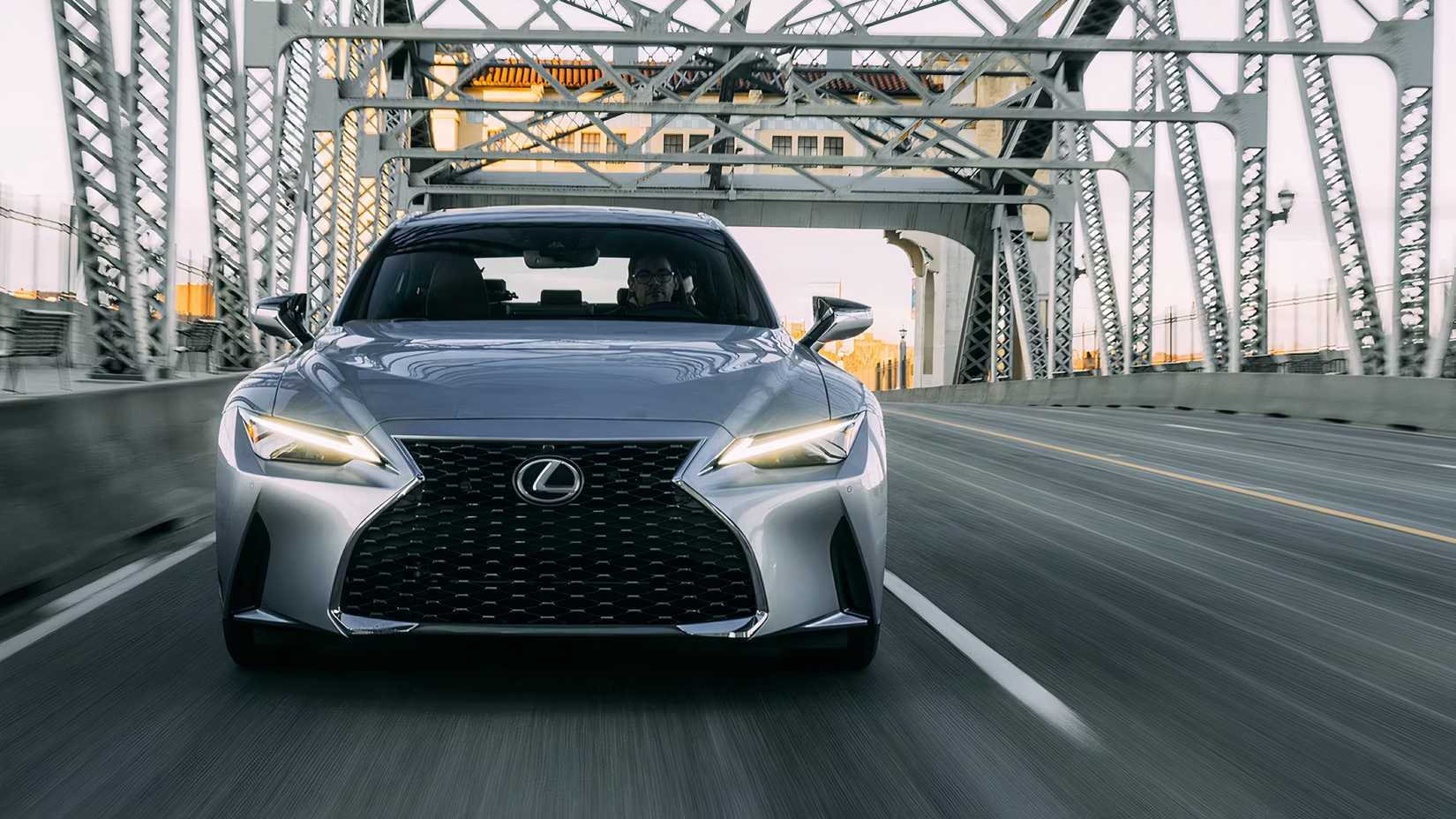 2025 Lexus IS 300 in silver driving on road