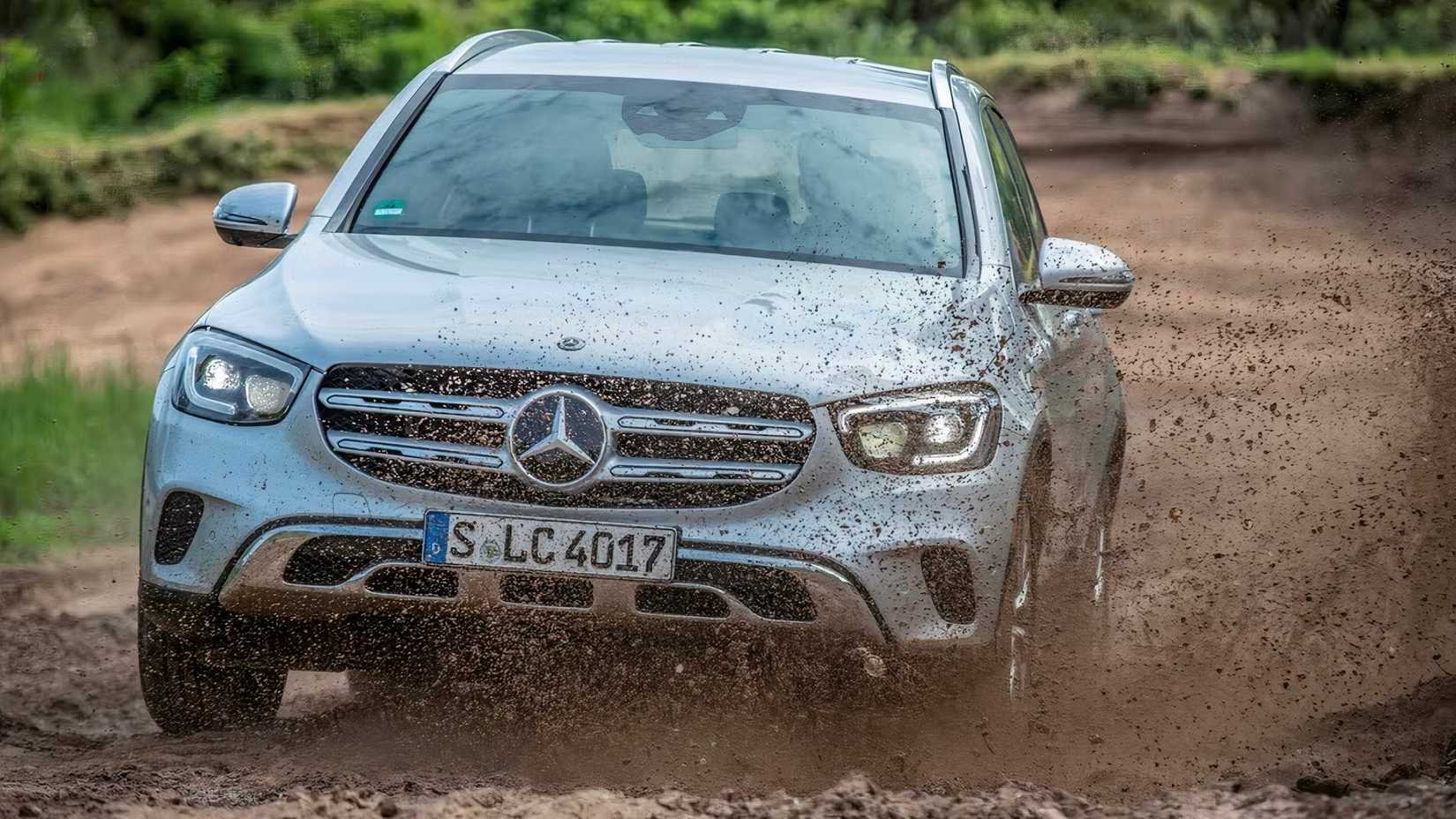 2020 Mercedes-Benz GLC in silver driving through mud