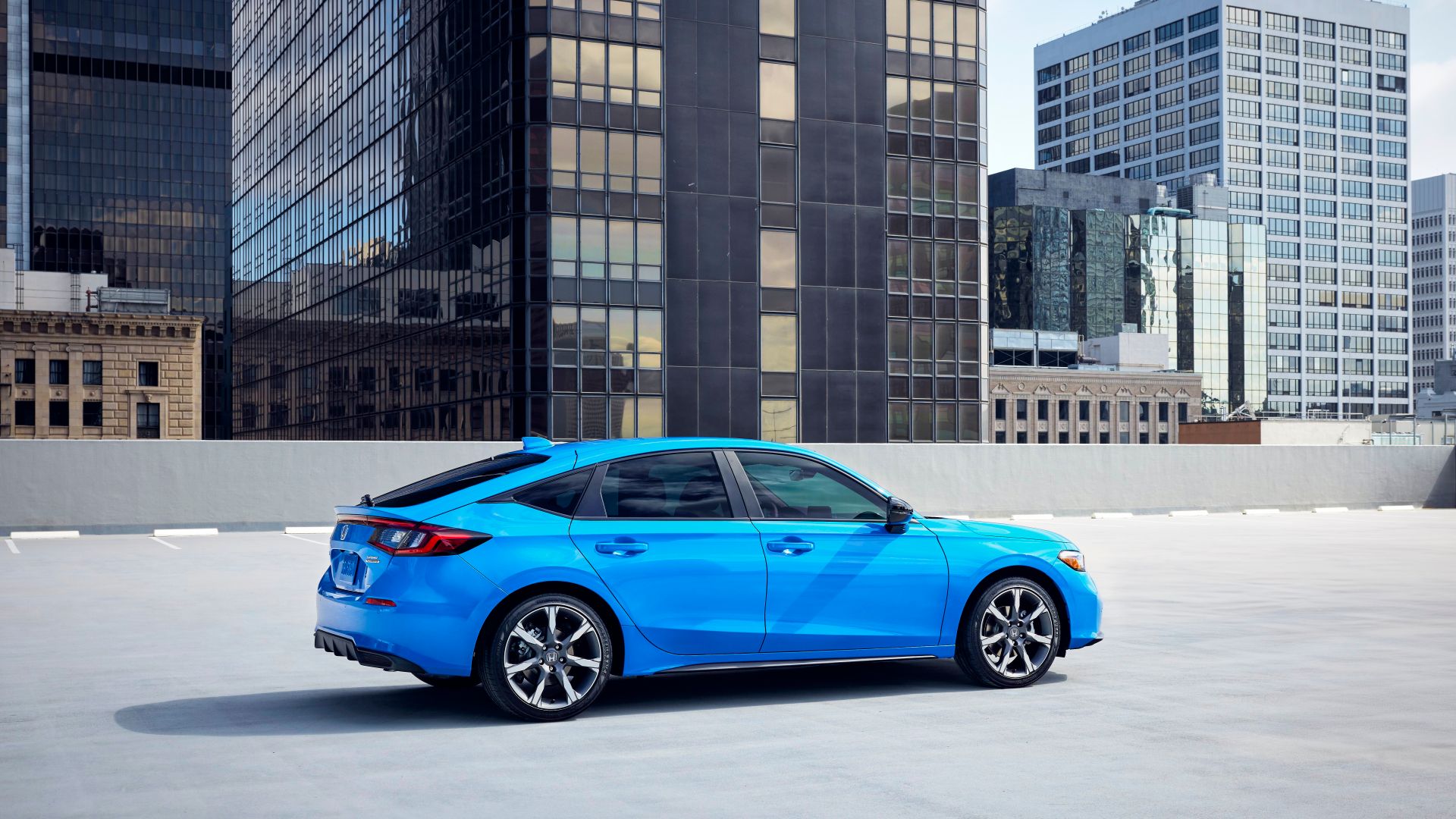 2025 Honda Civic Hatchback Sport Touring Hybrid side